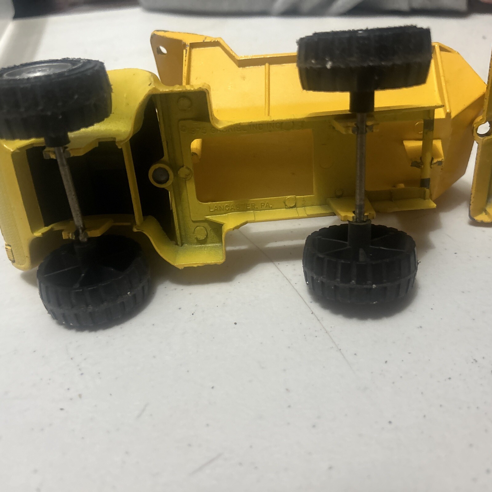 Vintage Gabriel Yellow pressed steel commercial trucks