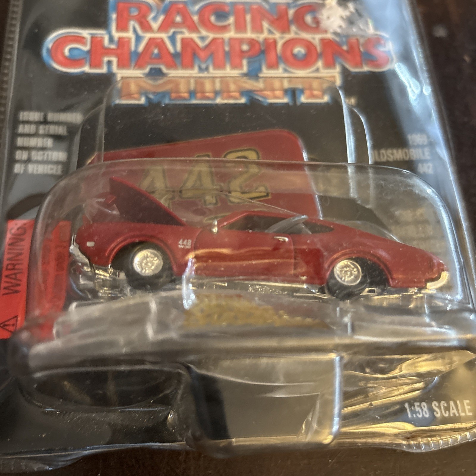 1969 OLDSMOBILE 442 W30 Red ISSUE #63 RACING CHAMPIONS MINT EMBLEM 1997 Damaged
