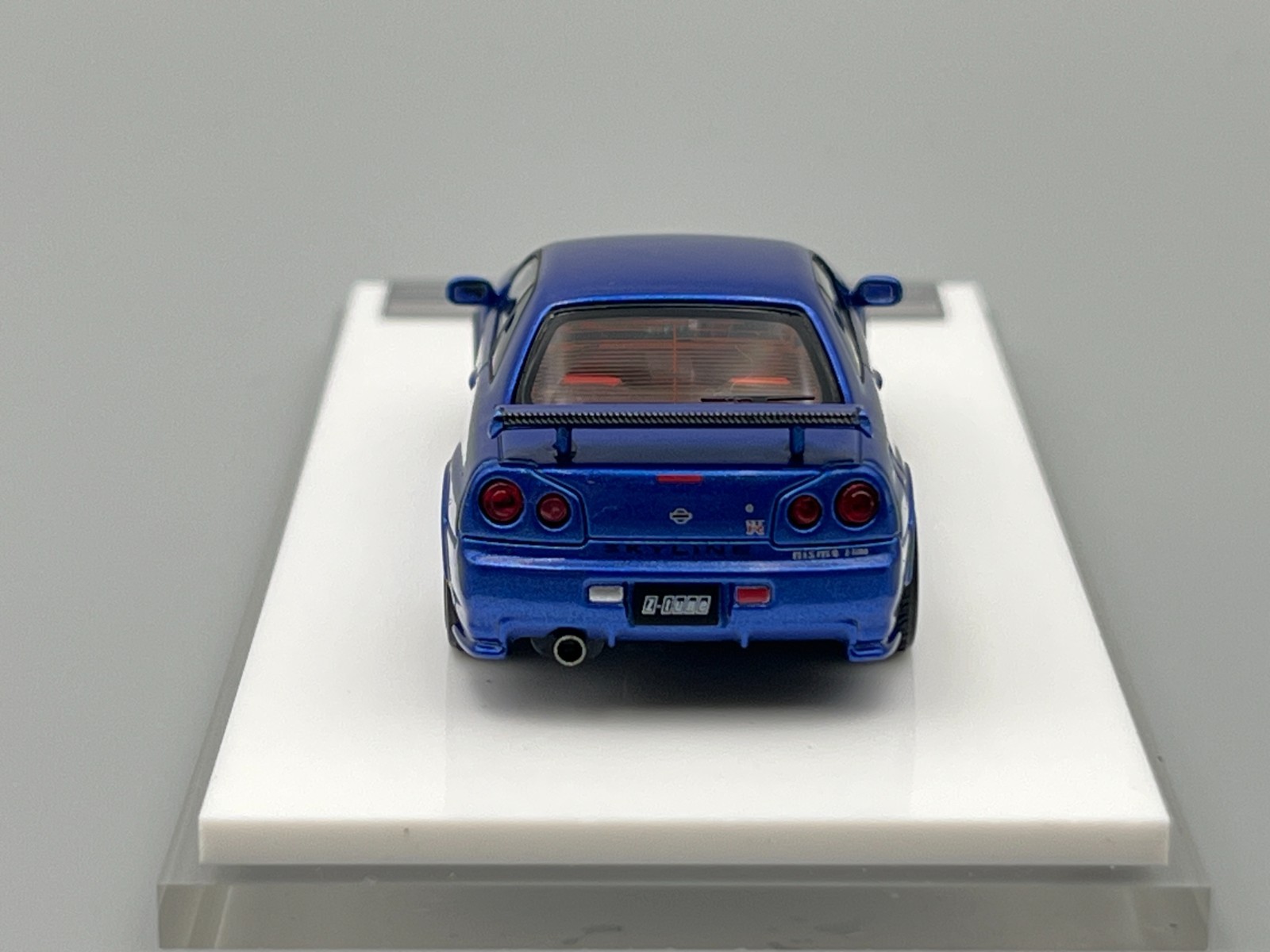 Nissan Skyline NISMO R34 GT-R Z-Tune Bayside Blue MotorHelix 1/64 scale display