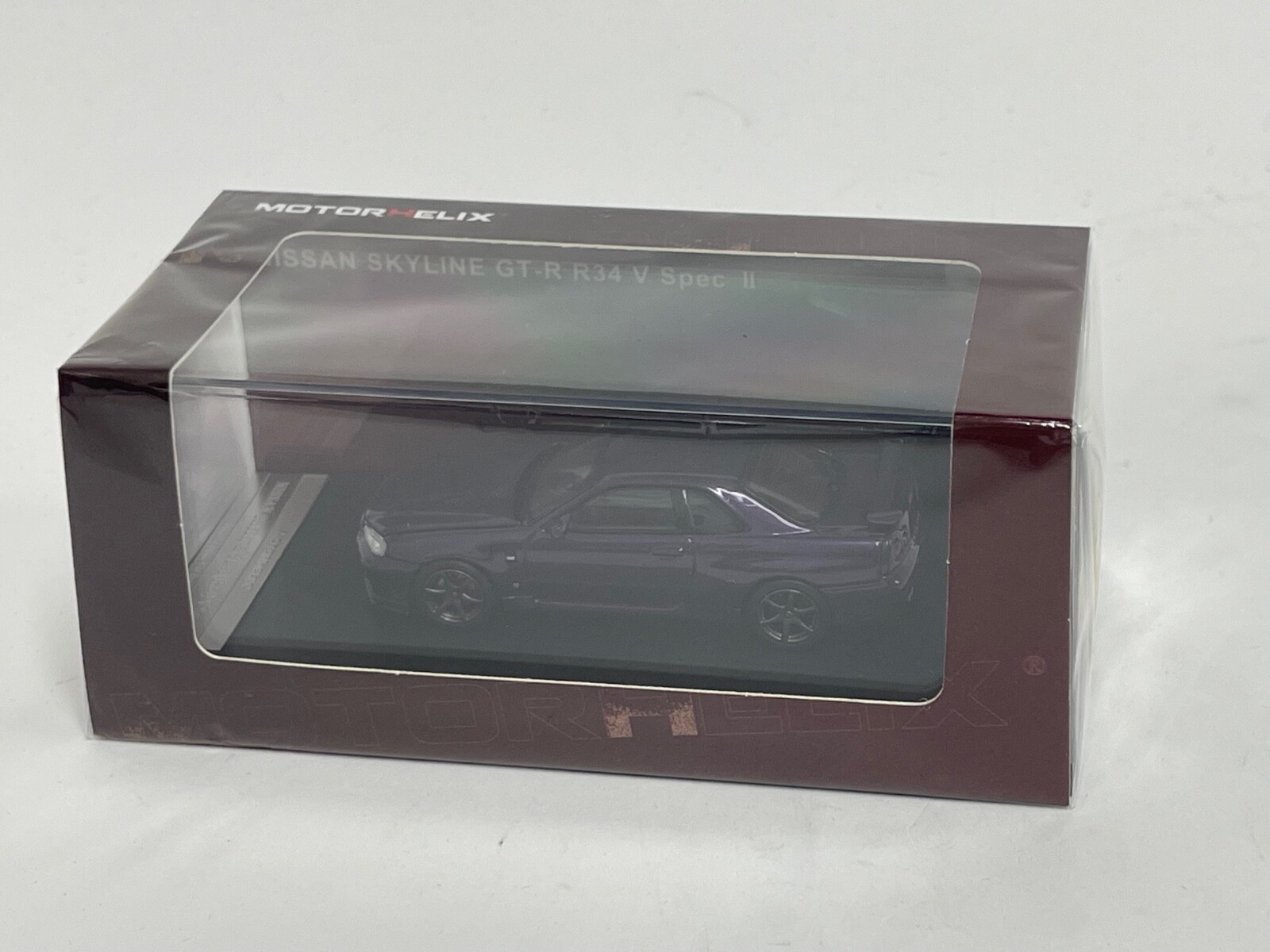 1/64 Motorhelix Nissan Skyline GT-R R34 V Spec II in Purple lmtd 599 pcs 64-002