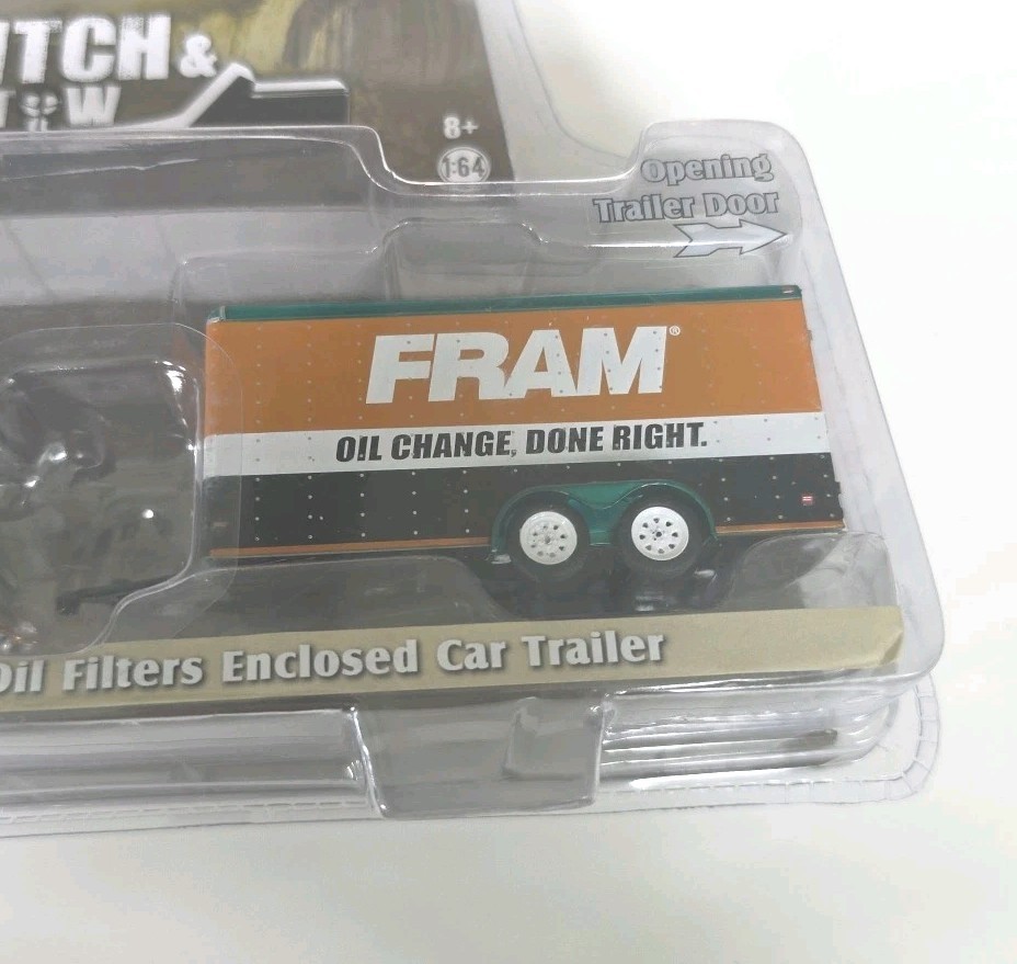 Greenlight Chase 1994 Ford F-150 XLT & Fram Oil Filters Enclosed Car Trailer