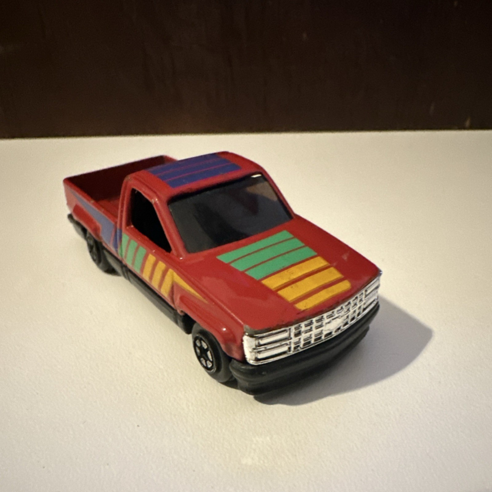 Chevrolet Red Diecast Pickup Truck Multicolor Stripes