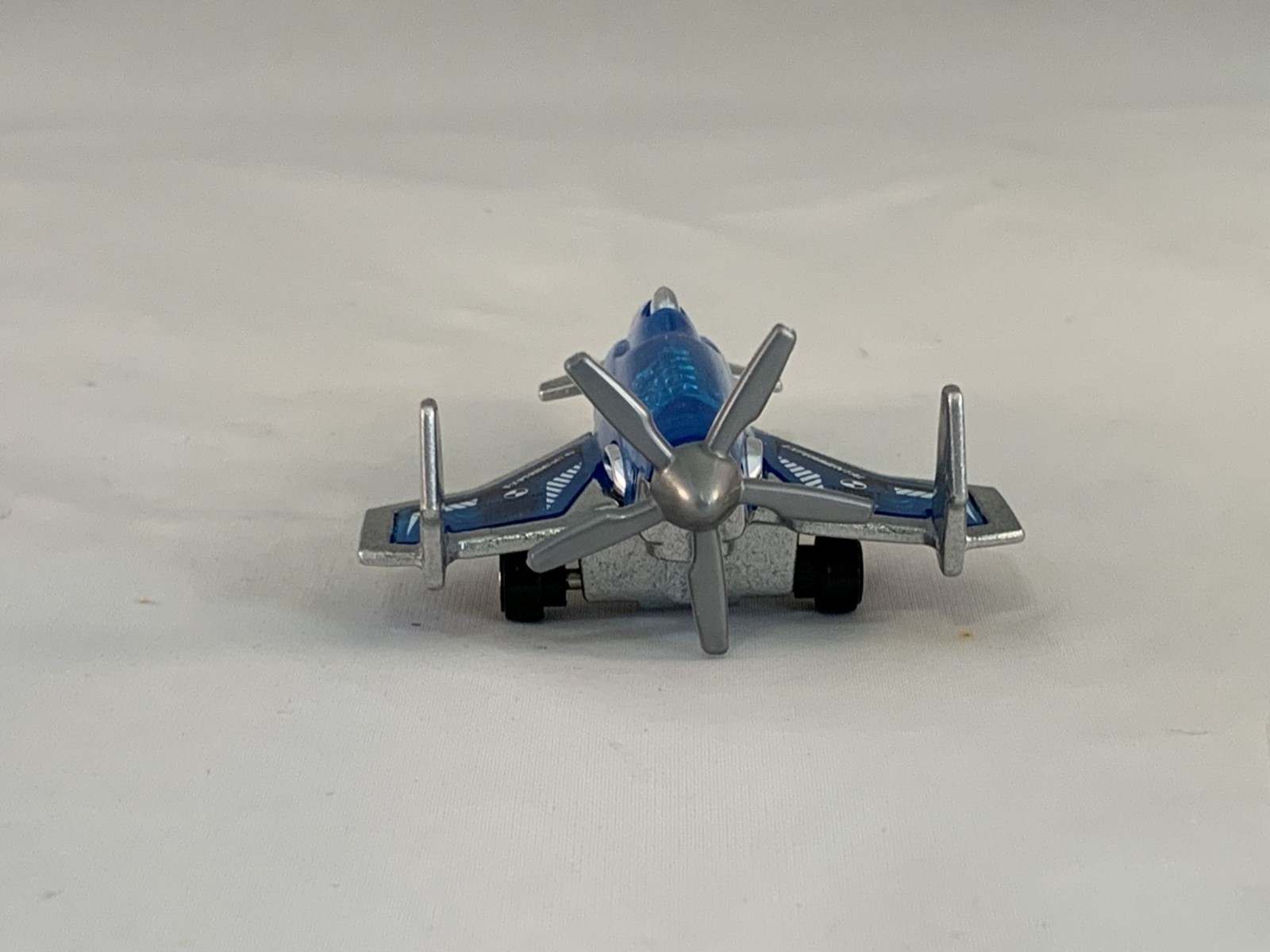 Hot Wheels Poison Arrow 2005 Kmart Clear Blue Micros