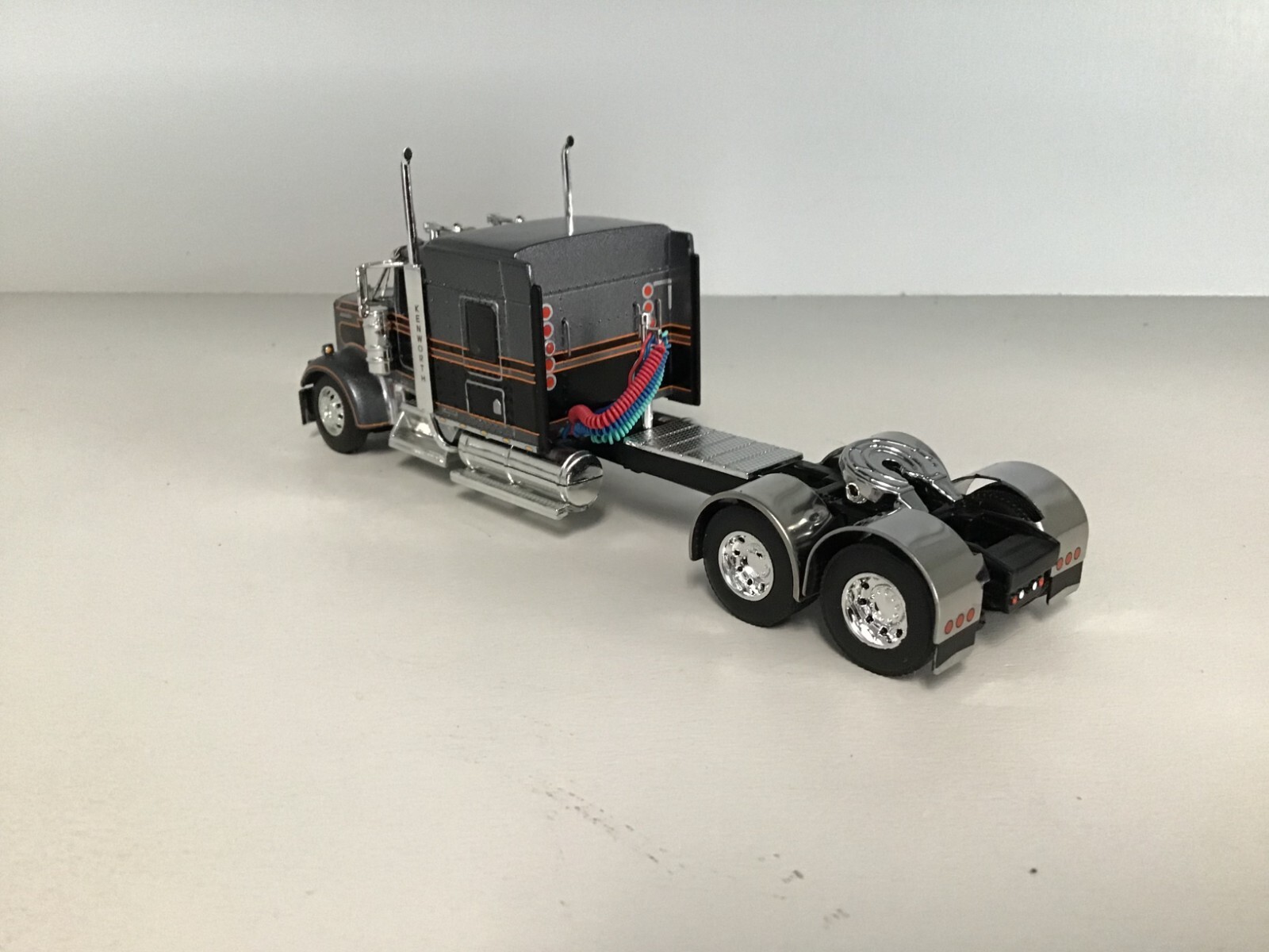 NEW DCP SILVER & BLACK KENWORTH W900L 72″ W/ 310” FRAME SS REAR FENDERS