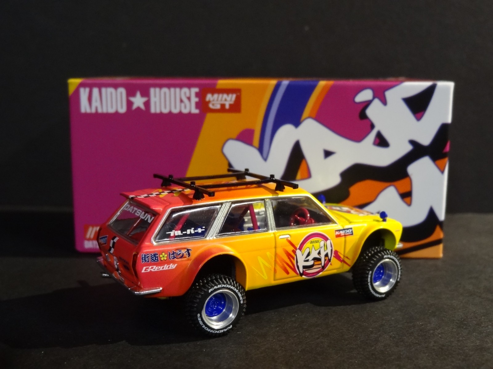 KAIDO HOUSE x MINI GT – DATSUN 510 WAGON 4X4 KAIDO ISLANDS V1 #KHMG210 -SEALED