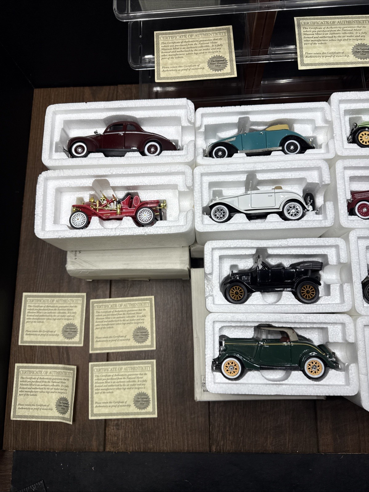Lot Of 12 NATIONAL MOTOR MUSEUM MINT CARS WITH DISPLAY STAND