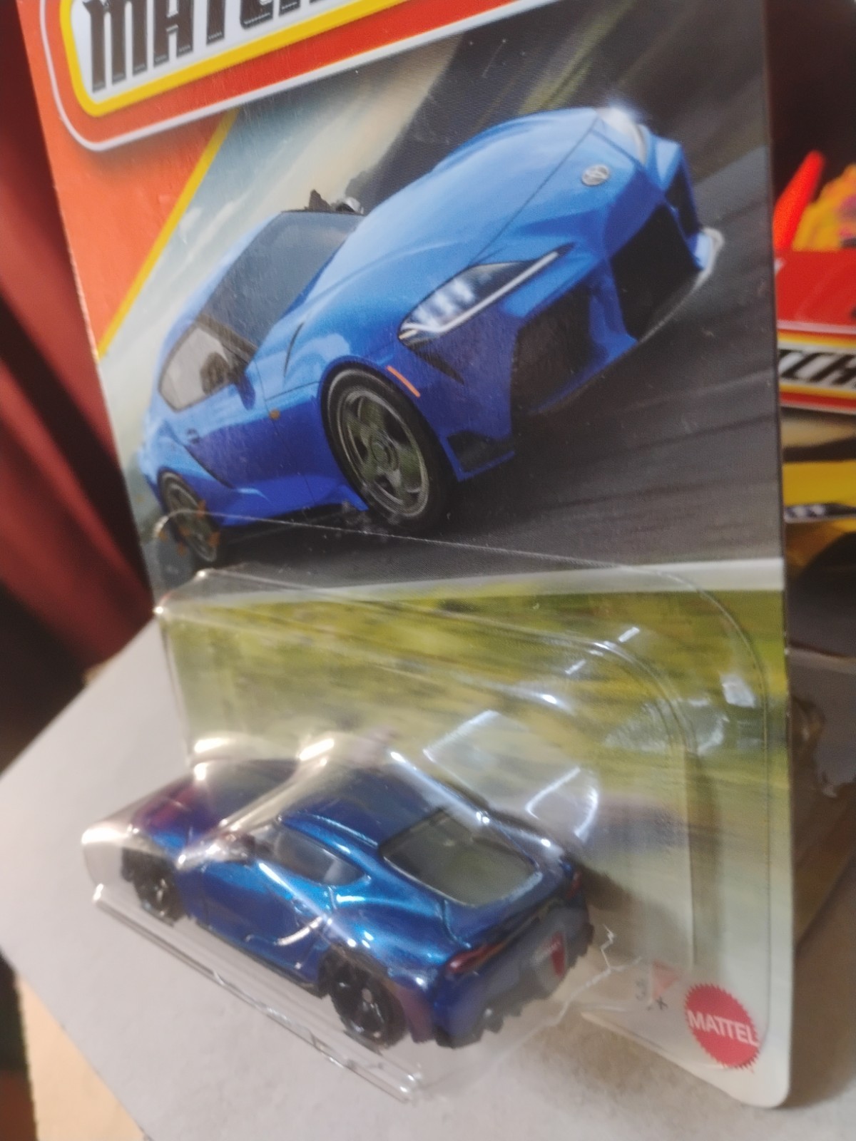 Blue And Yellow 2023 Toyota Gr Supra Matchbox 164 Scale