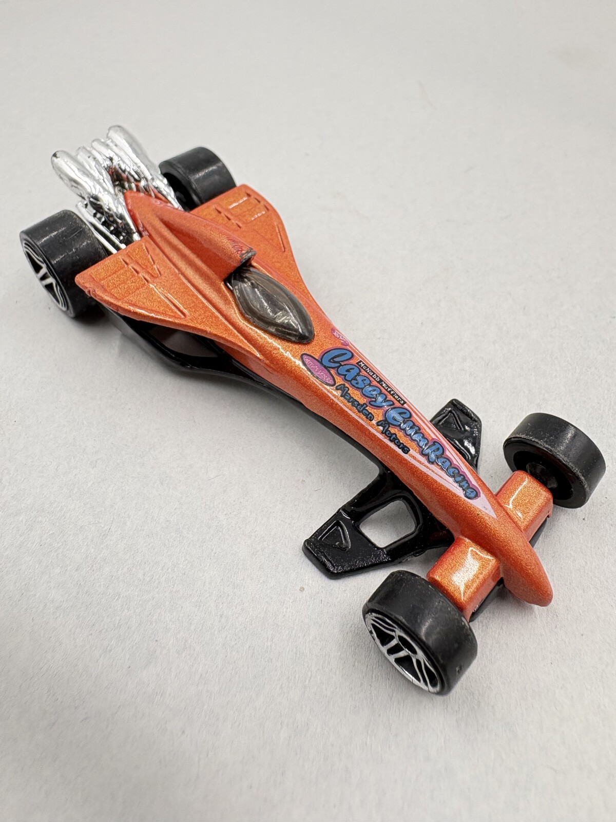 2001 Hot Wheels Greased Lightnin’ #131 Pearl Orange Casey Erin Racing Loose