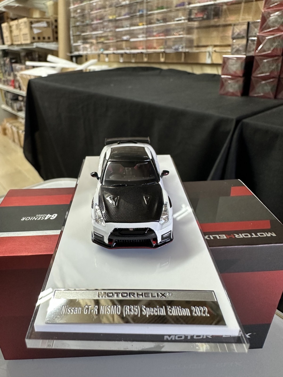 NISSAN SKYLINE GT-R R35 NISMO CARBON WHITE HOOD OPEN 1/64 CAR BY MOTORHELIX MH