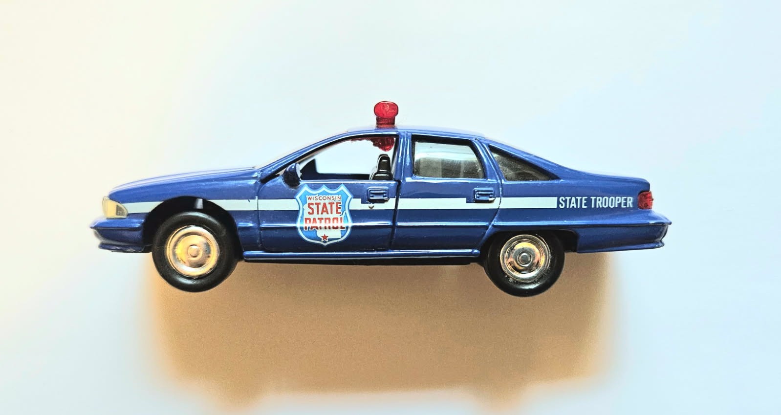 Road Champs Wisconsin State Patrol die-cast and plastic Caprice toy – 1/43 scale