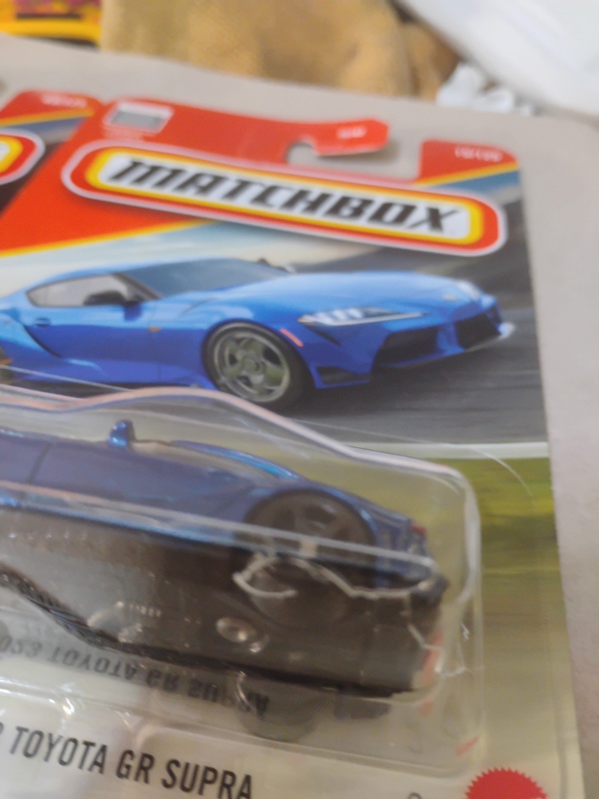 Blue And Yellow 2023 Toyota Gr Supra Matchbox 164 Scale