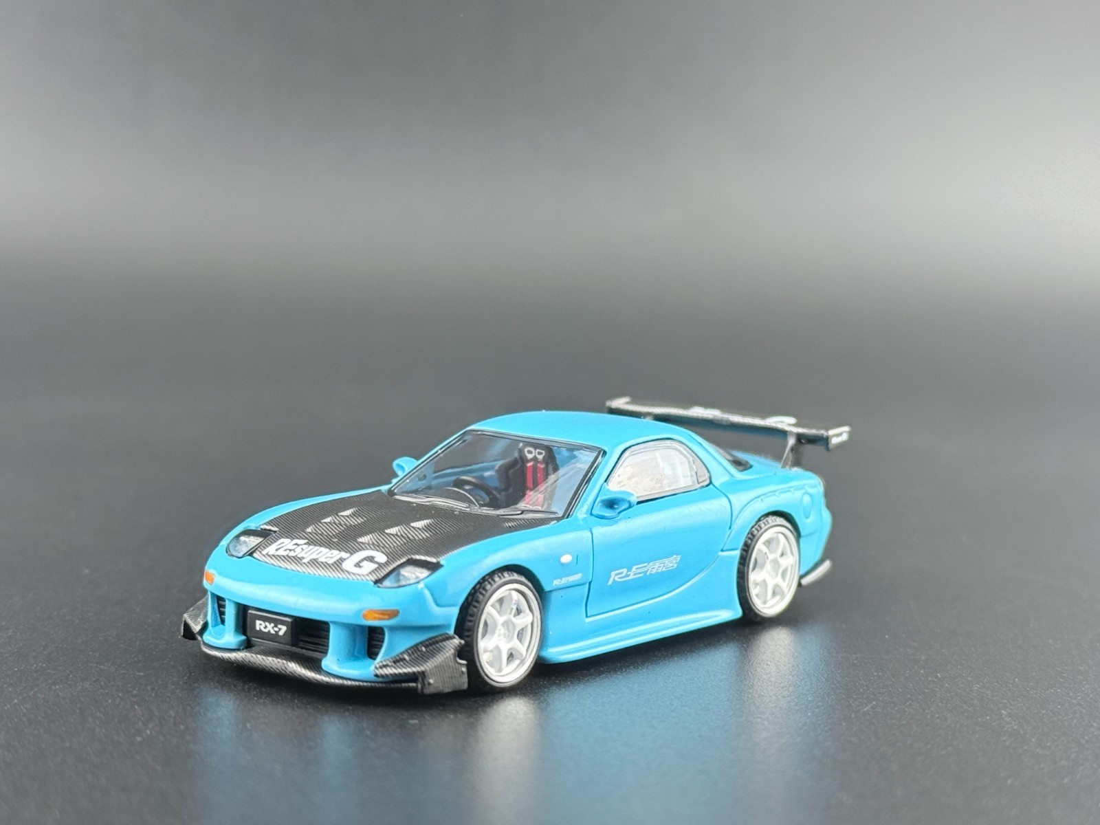 Pop Race Mazda RX7 FD3S RE-Amemiya Light Blue TAS 2026 640472 1/64