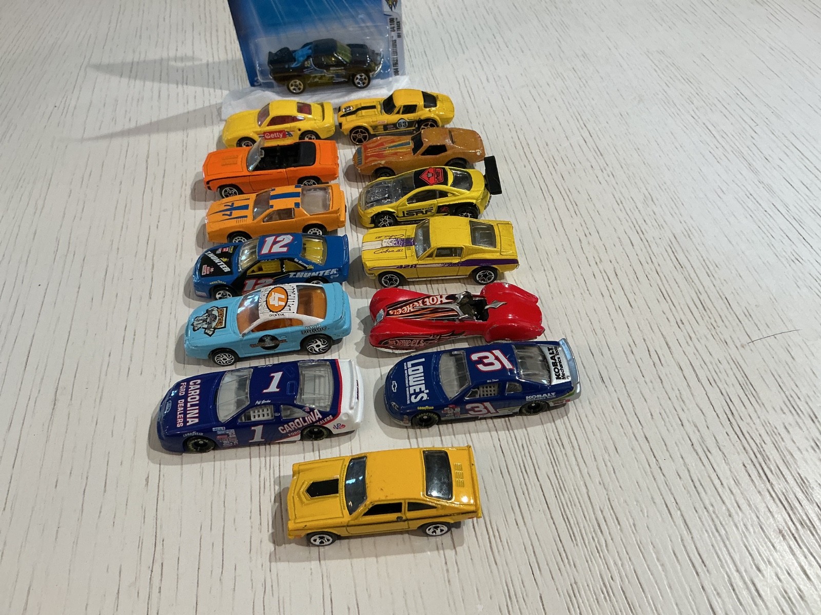 Pre owned 14 piece Die Cast car collection/ Various Years, Makes & Models