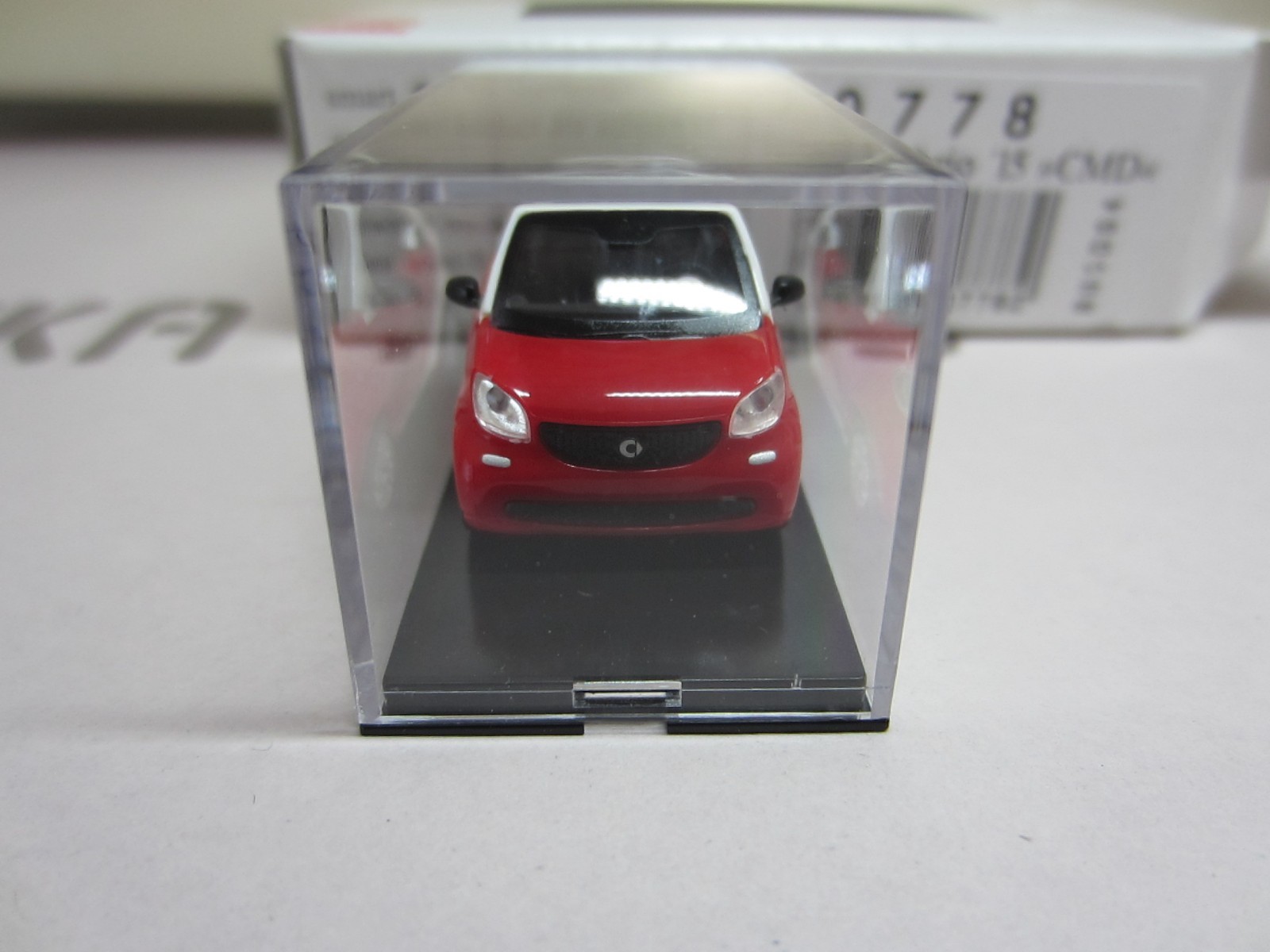 BUSCH 50778 SMART FORTWO CABRIO 2015 in RED – model is PLASTIC – HO / 1:87 scale