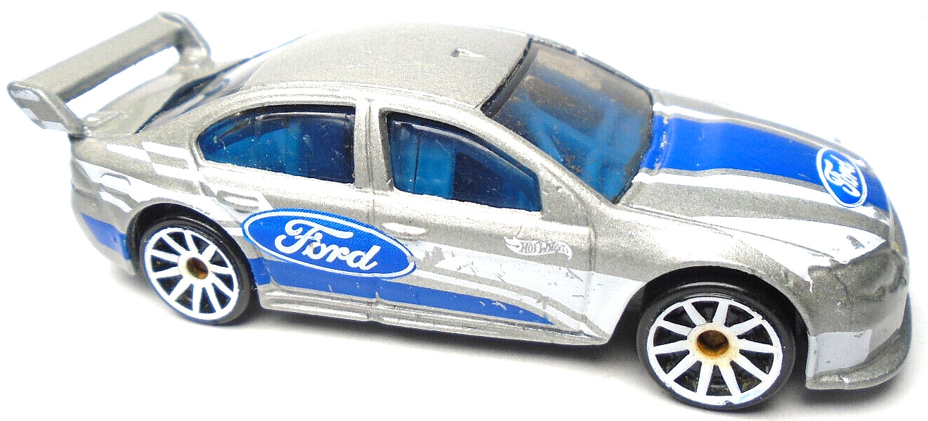 2021 HOT WHEELS FORD FALCON SILVER 1:64 DIECAST 3″ RACE CAR WITH BLUE & WHITE