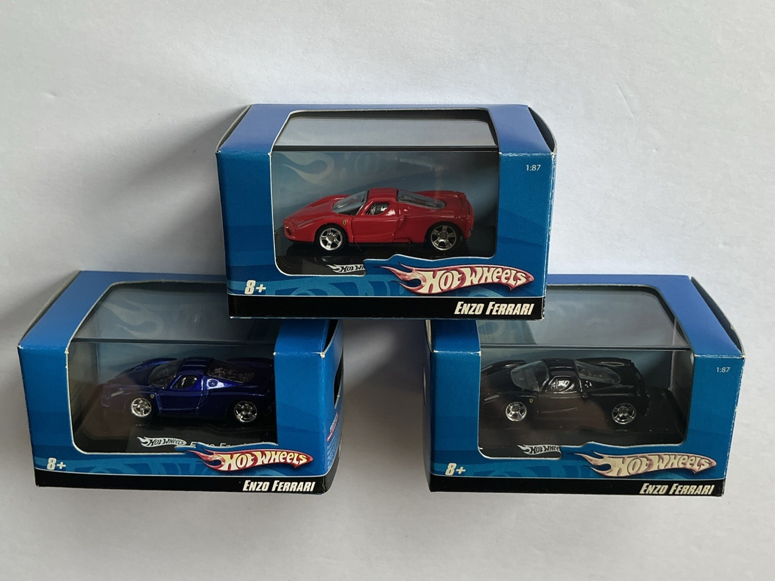 Hot Wheels 2007 ENZO FERRARI 1:87/HO Scale Lot of 3 Red, Black & Blue NIP