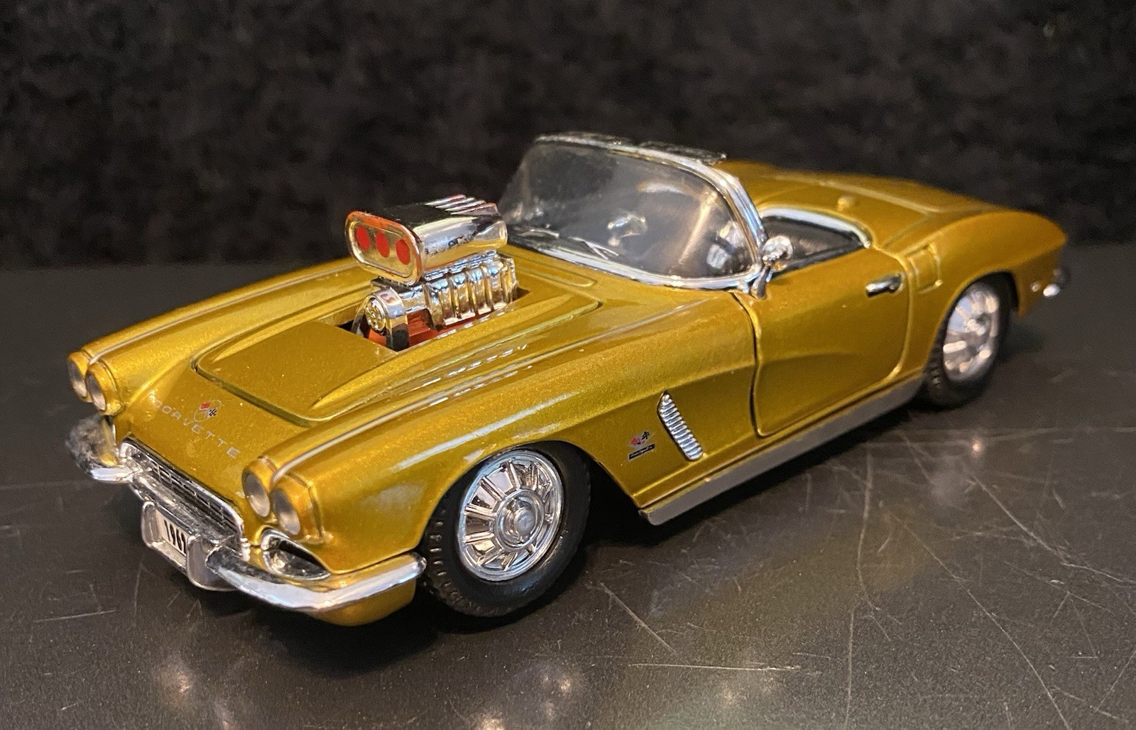 1962 Gold Chevrolet Corvette Convertible 1/32 Scale. SS 5750. Pullback action.