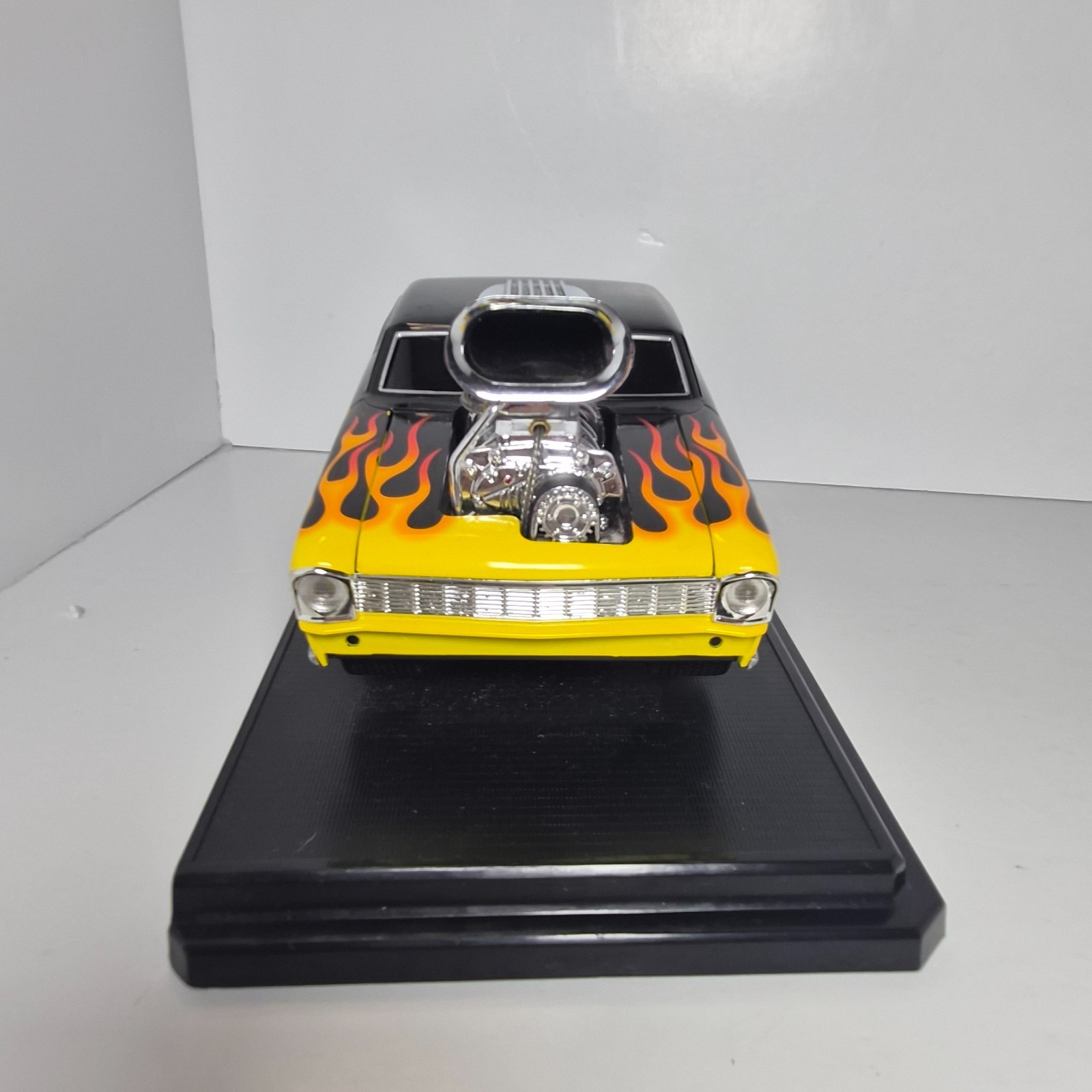 Muscle Machines 1967 Chevy Nova Black Flames 1:18 Diecast w/ Base