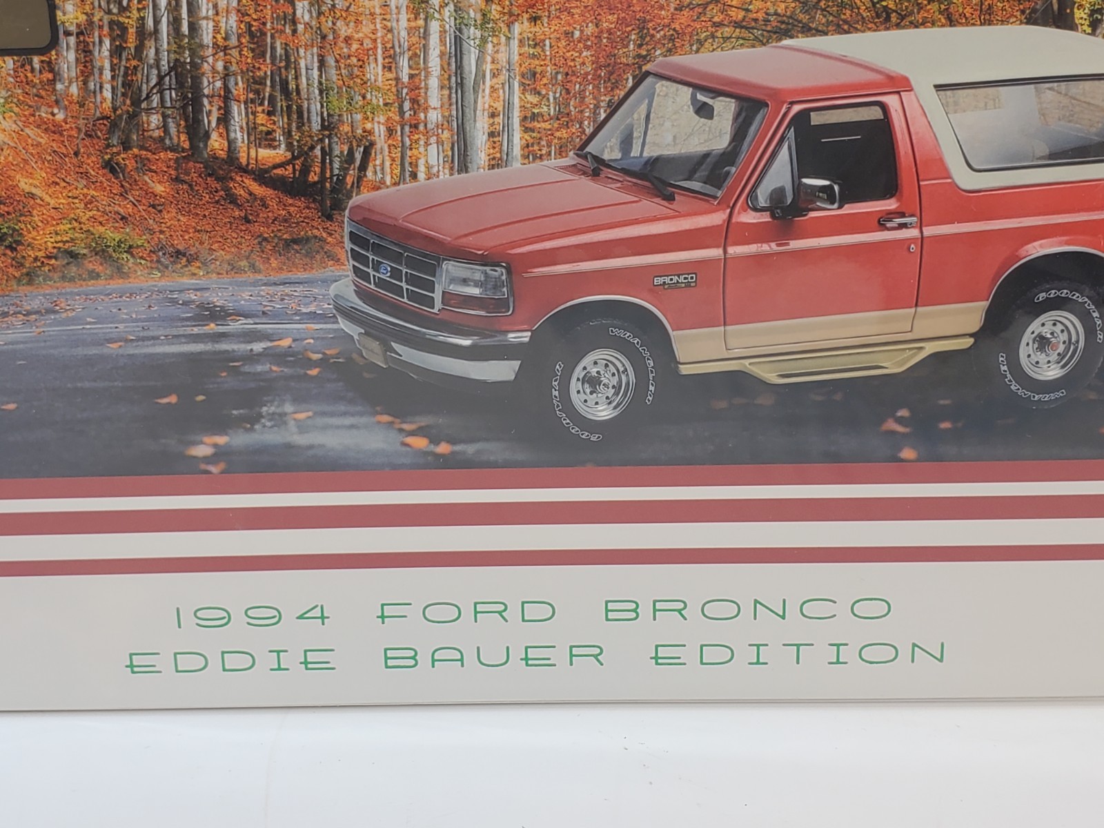 Greenlight 1994 Ford Bronco Eddie Bauer Edition Electric Red & Bronze 1/18