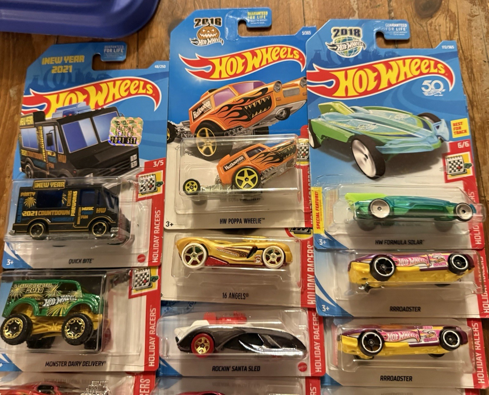 GROUP/LOT OF HOT WHEELS HOLIDAY RACERS! VARIOUS YEARS! 14 TOTAL DIE-CAST CARS!