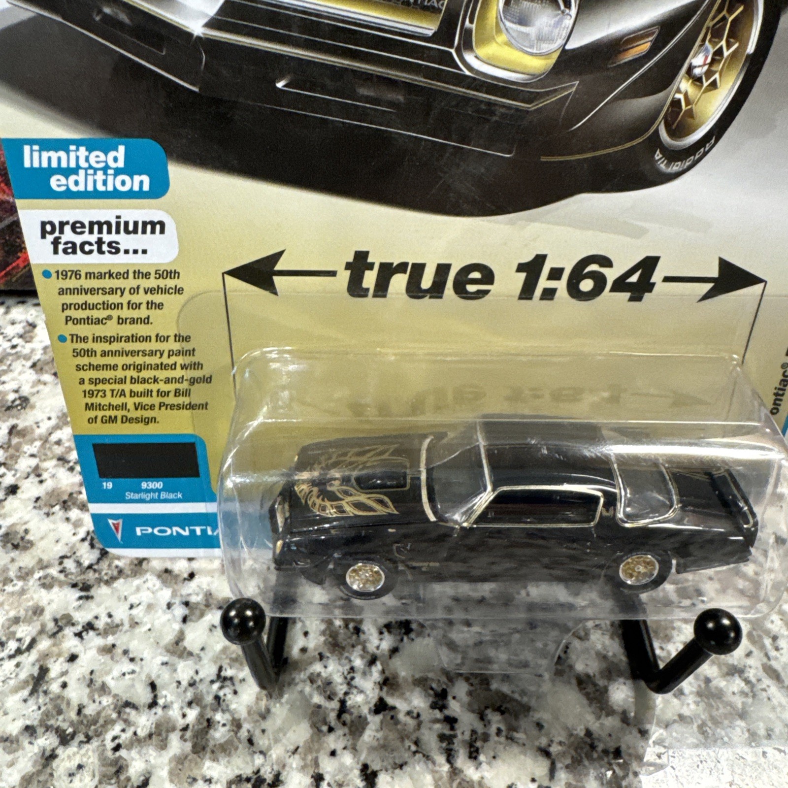 Auto World 1/64 1976 Pontiac Firebird T/A Toy Car – Gloss Black/Gold Bird…