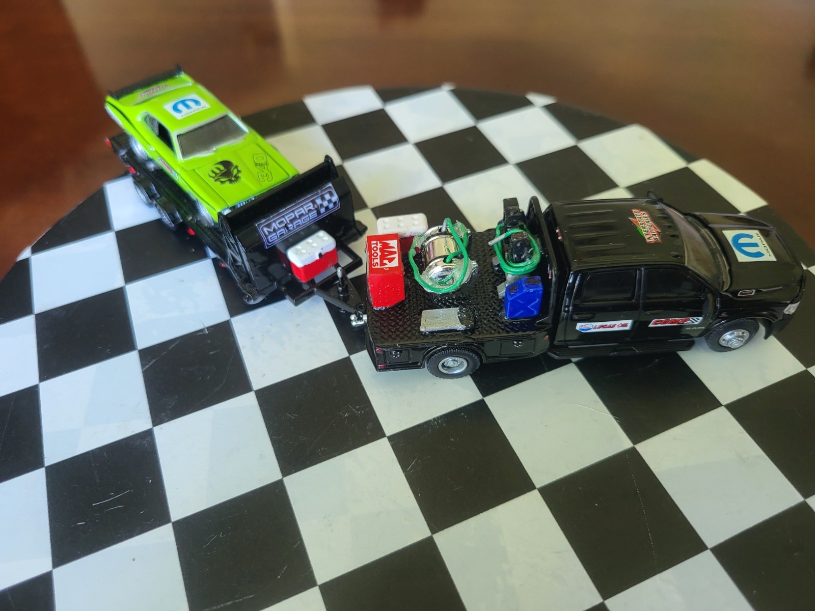 1:64 Greenlight Dually Drivers 2023 RAM 3500 Dually Flatbed & 71 Plym Duster 340