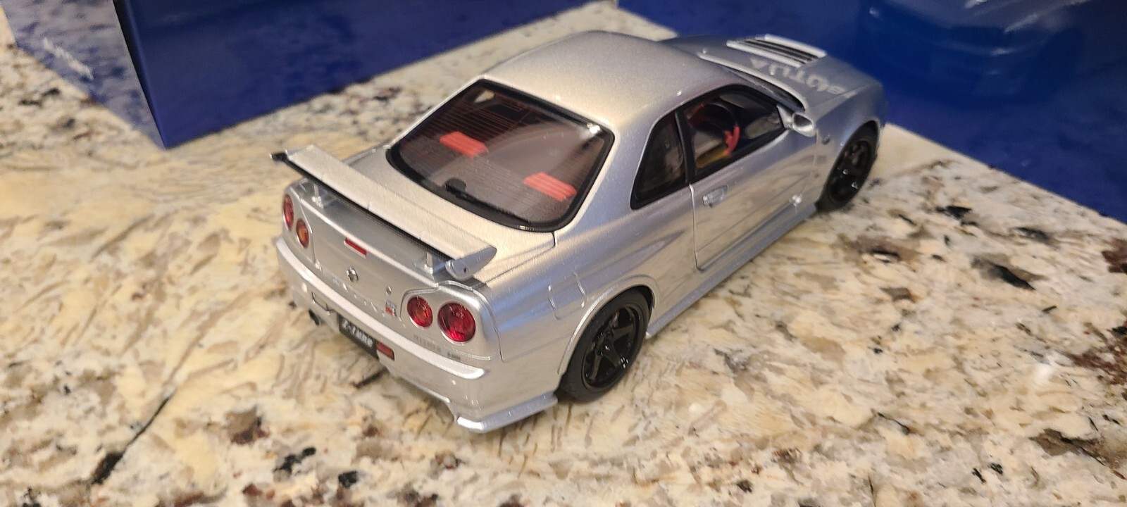 Nissan Skyline GT-R (R34) Z-Tune, Z-Tune Silver in 1:18 scale by AUTOart 77461