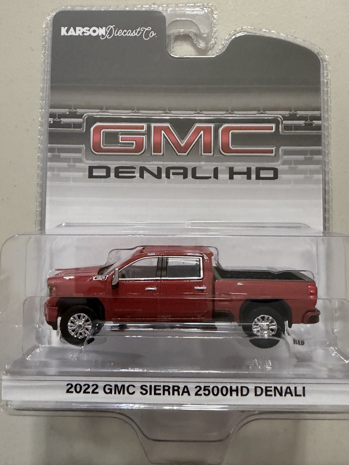 1:64 Greenlight 2022 GMC Sierra 2500 HD Denali Cayenne Red Metallic Karson Excl