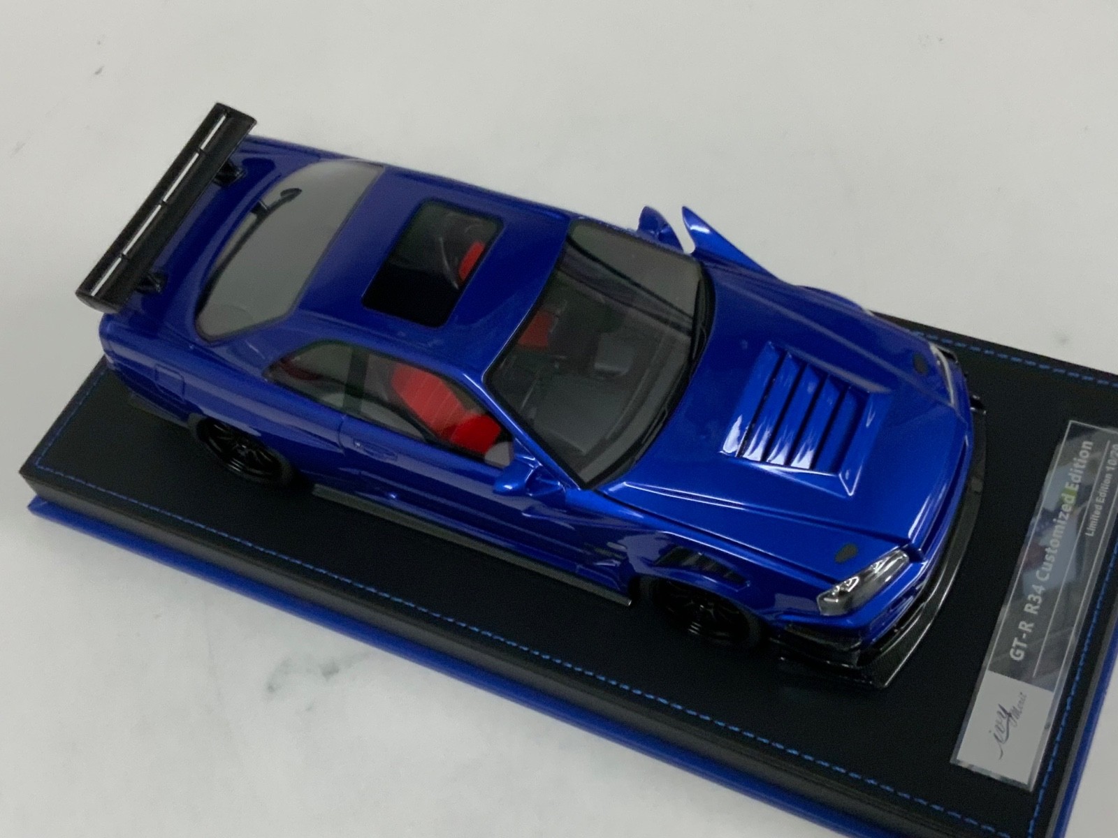1/18 IVY Nissan R34 customized with Full Engine Blue leather base 20 pieces