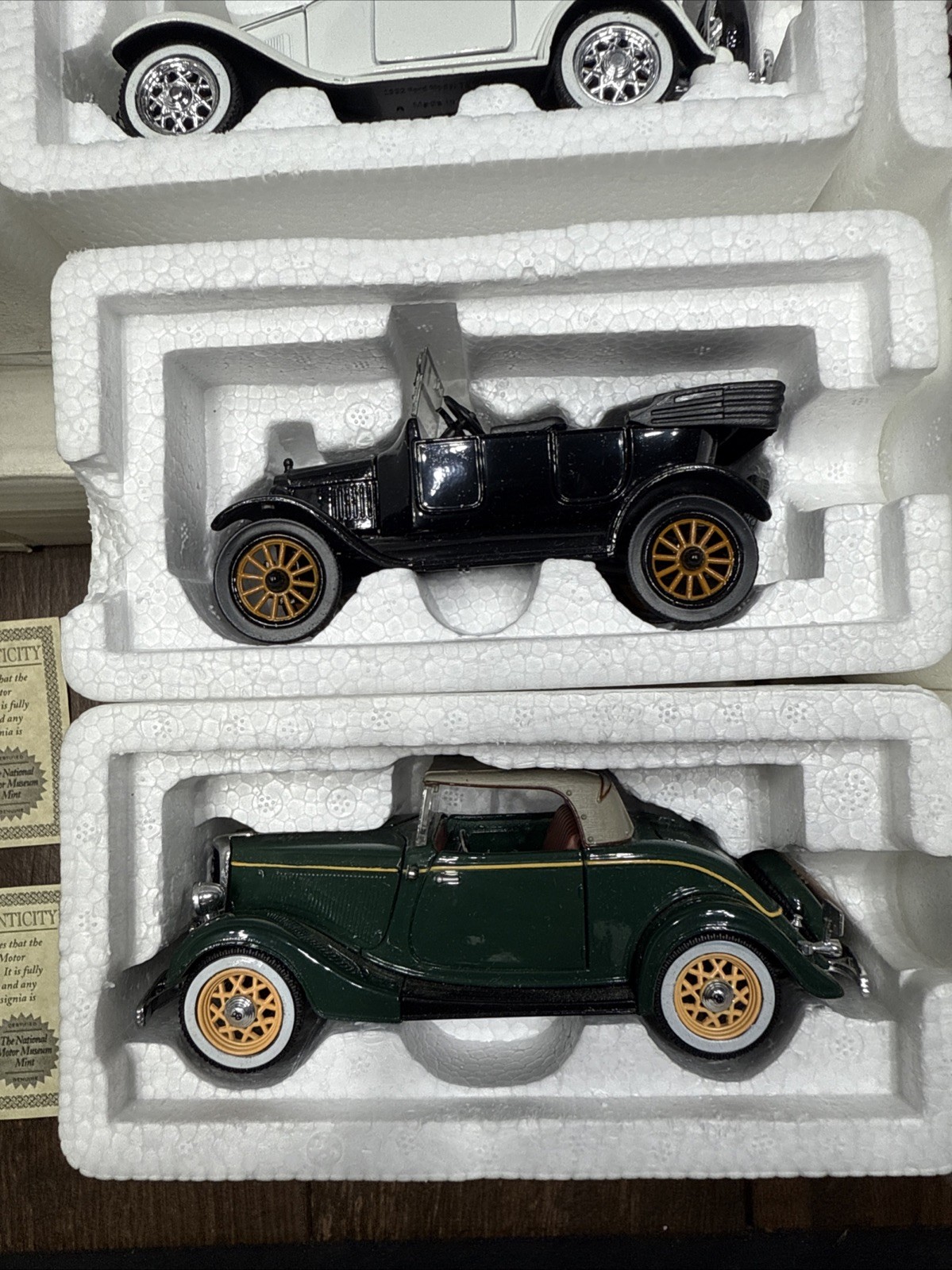 Lot Of 12 NATIONAL MOTOR MUSEUM MINT CARS WITH DISPLAY STAND