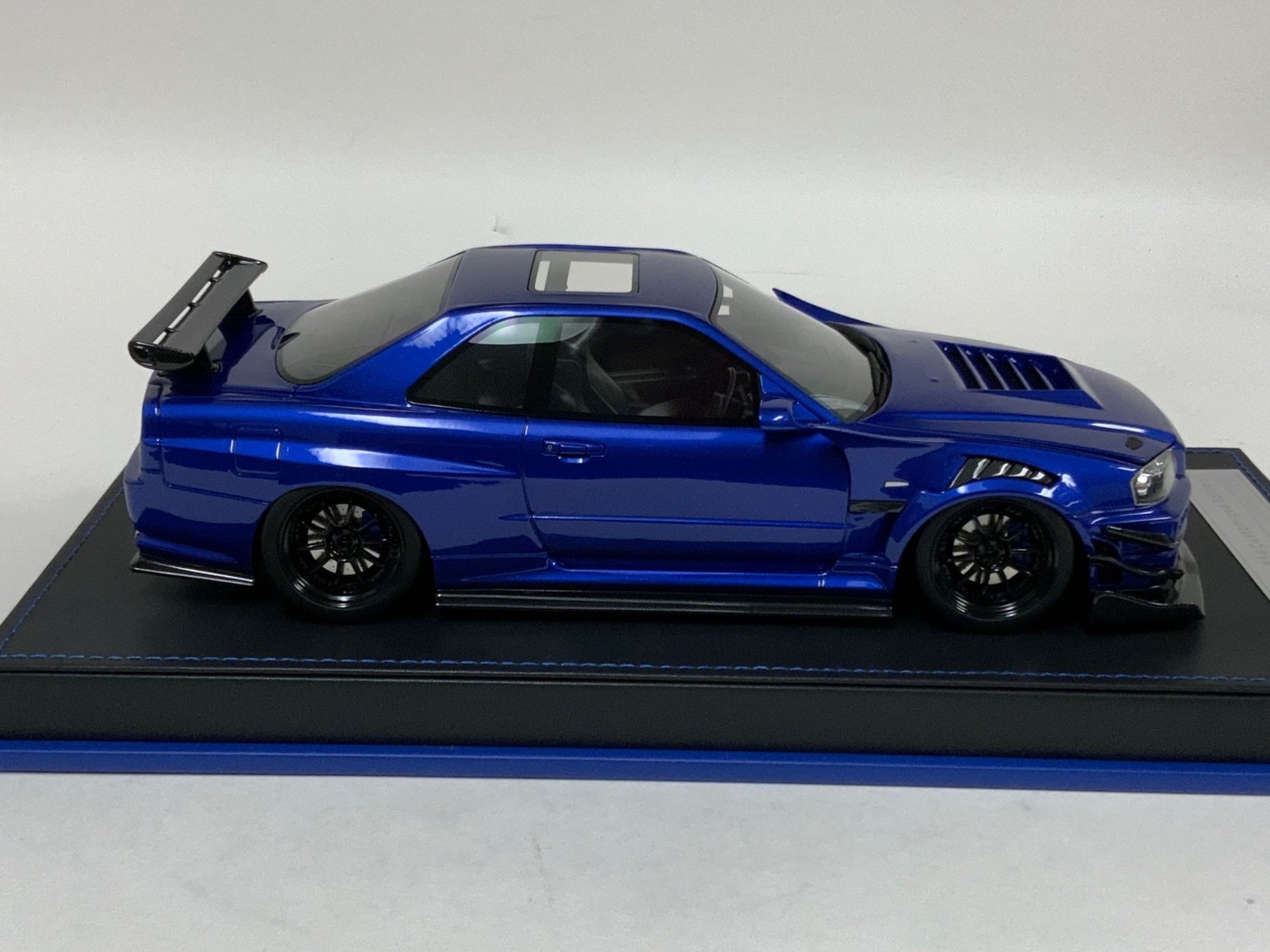1/18 IVY Nissan R34 customized with Full Engine Blue leather base 20 pieces
