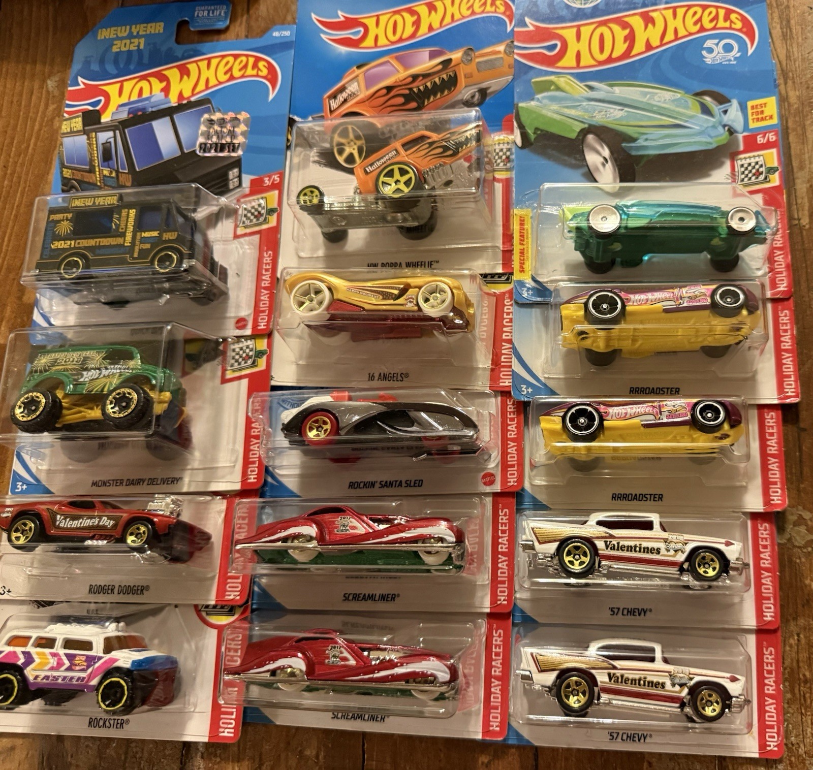 GROUP/LOT OF HOT WHEELS HOLIDAY RACERS! VARIOUS YEARS! 14 TOTAL DIE-CAST CARS!