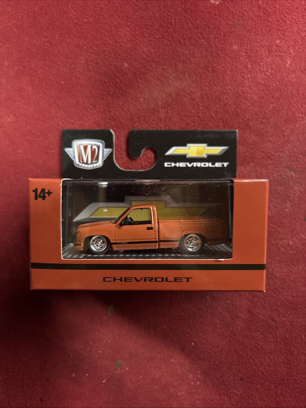 M2 Machines Chevrolet Orange Diecast Pickup Truck 1:64 Scale 14+ Years Boxed