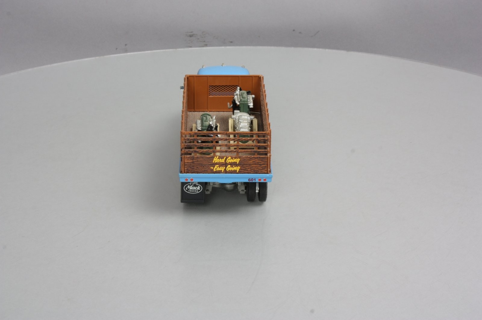 First Gear 19-3155 1:34 Scale Diecast Mack L Series Stake Truck with Engine Load