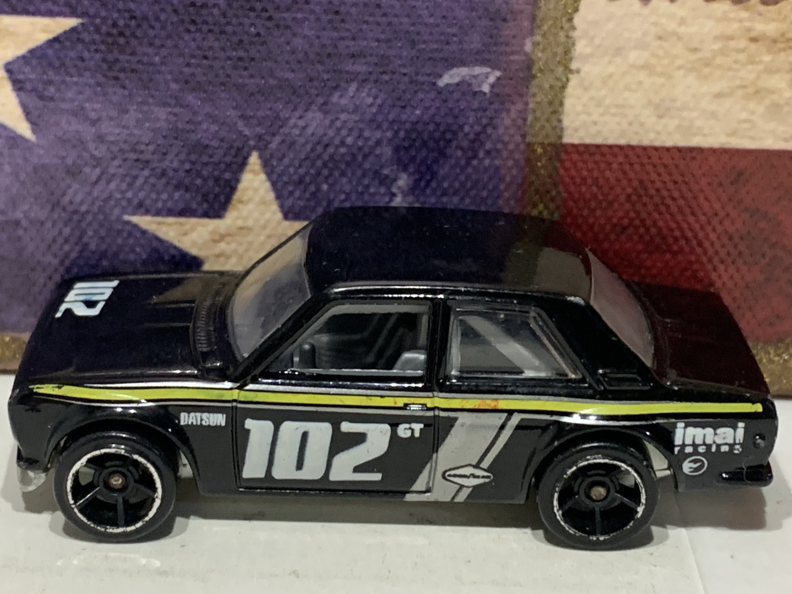 HOT WHEELS DATSUN BLUEBIRD 510. 2009 NEW MODELS. BLACK/YELLOW #102. LOOSE