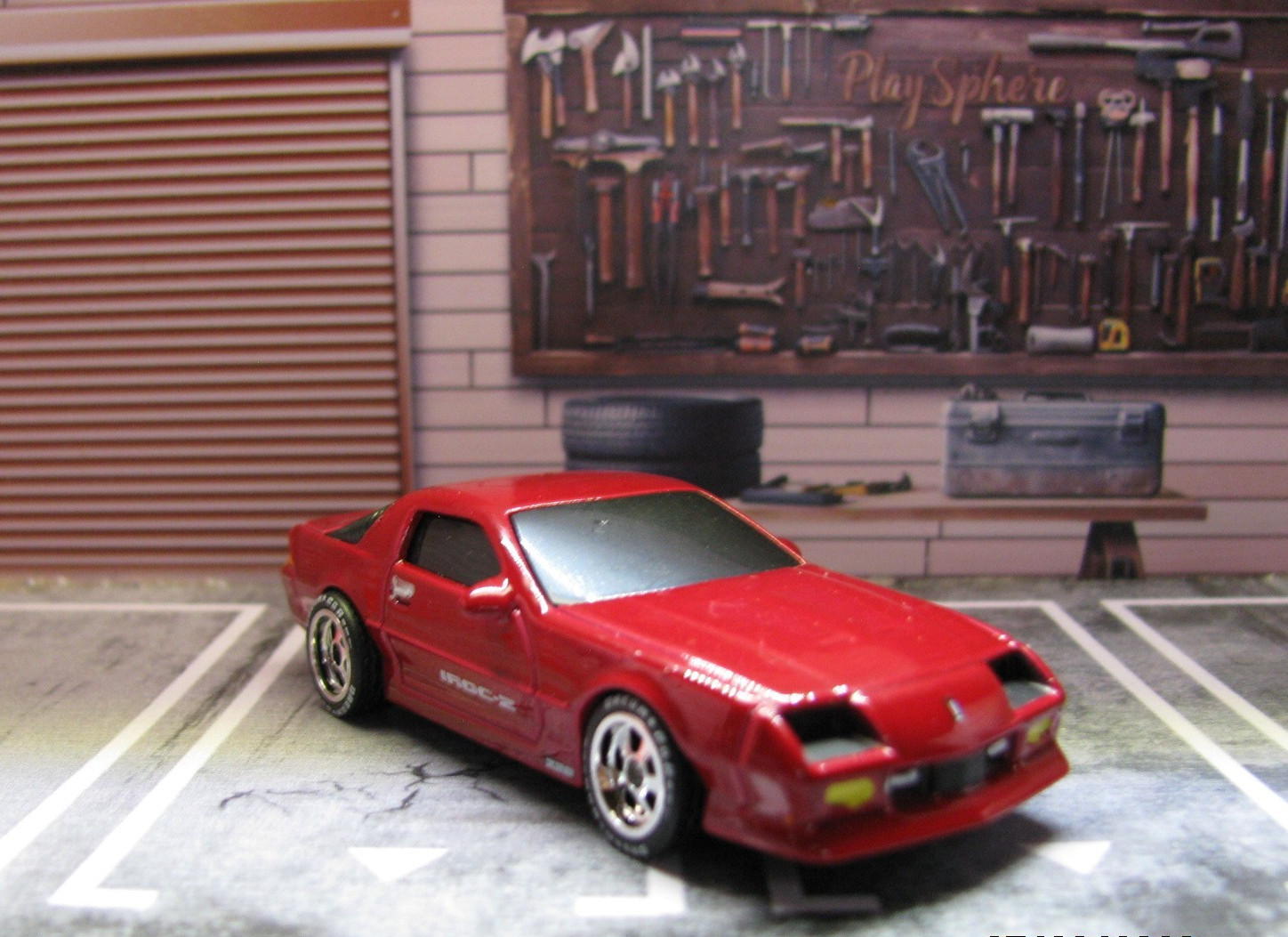 2025 Maisto Red 1985 Chevy Camaro IROC-Z, w/Real Riders Wheel Swap