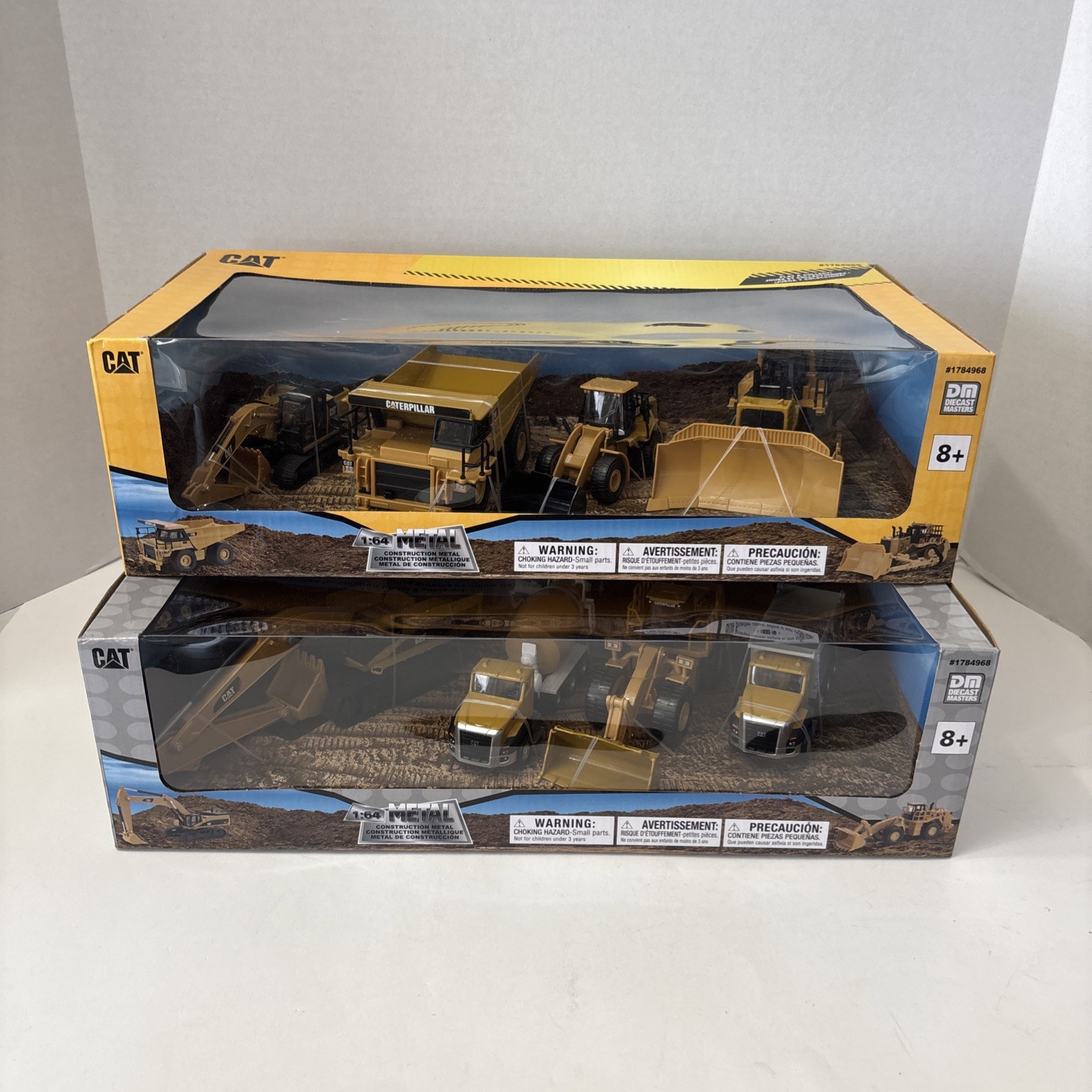 Diecast Masters 1:64 CATERPILLAR Metal Construction Trucks 2 Sets Of 4 – SEALED