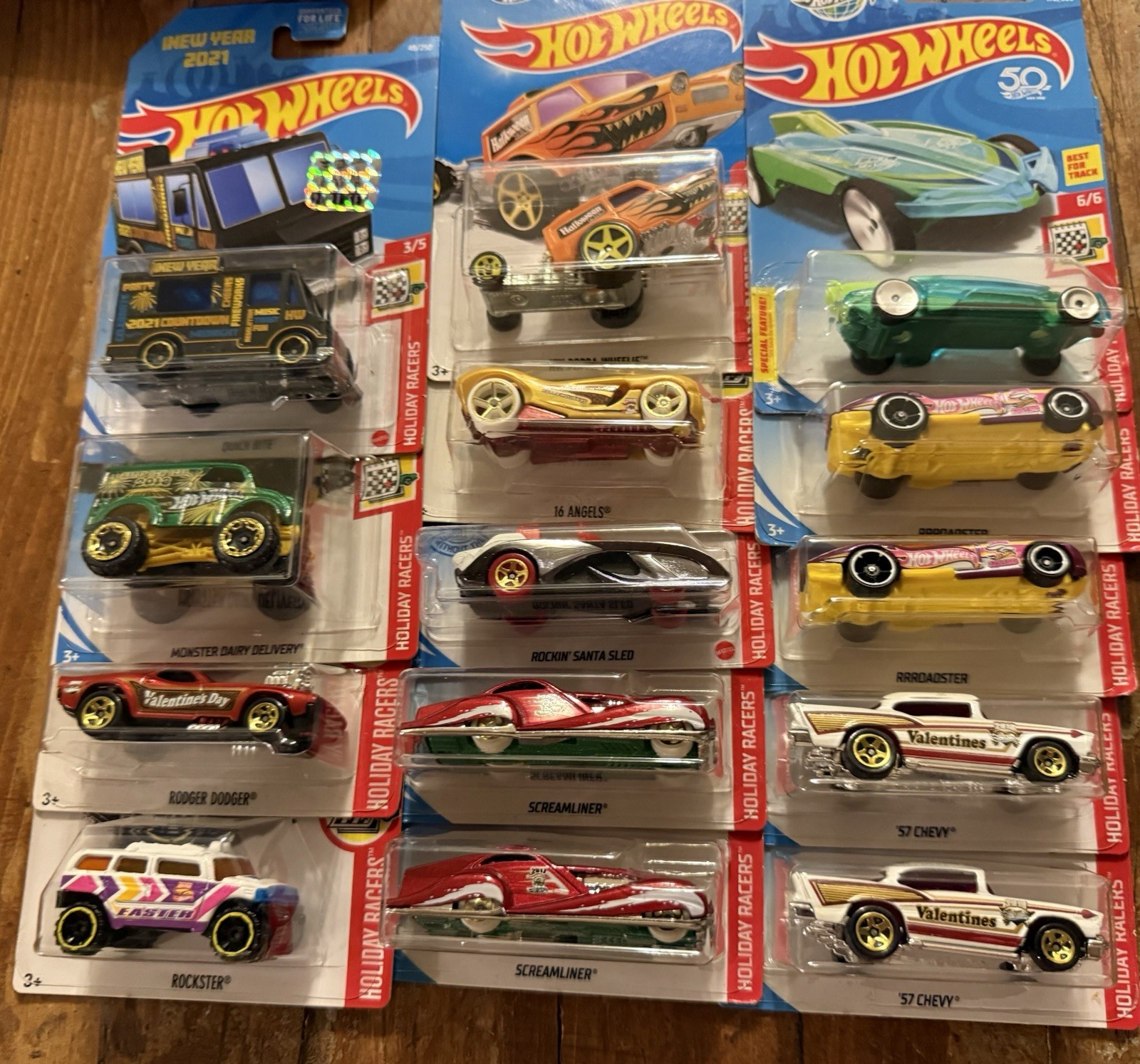 GROUP/LOT OF HOT WHEELS HOLIDAY RACERS! VARIOUS YEARS! 14 TOTAL DIE-CAST CARS!