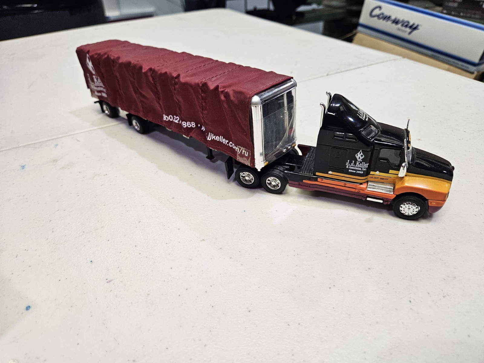 SpecCast J.J. Keller 1:64 Kenworth T-600B w/Conestoga Trailer #830-PP *Details*