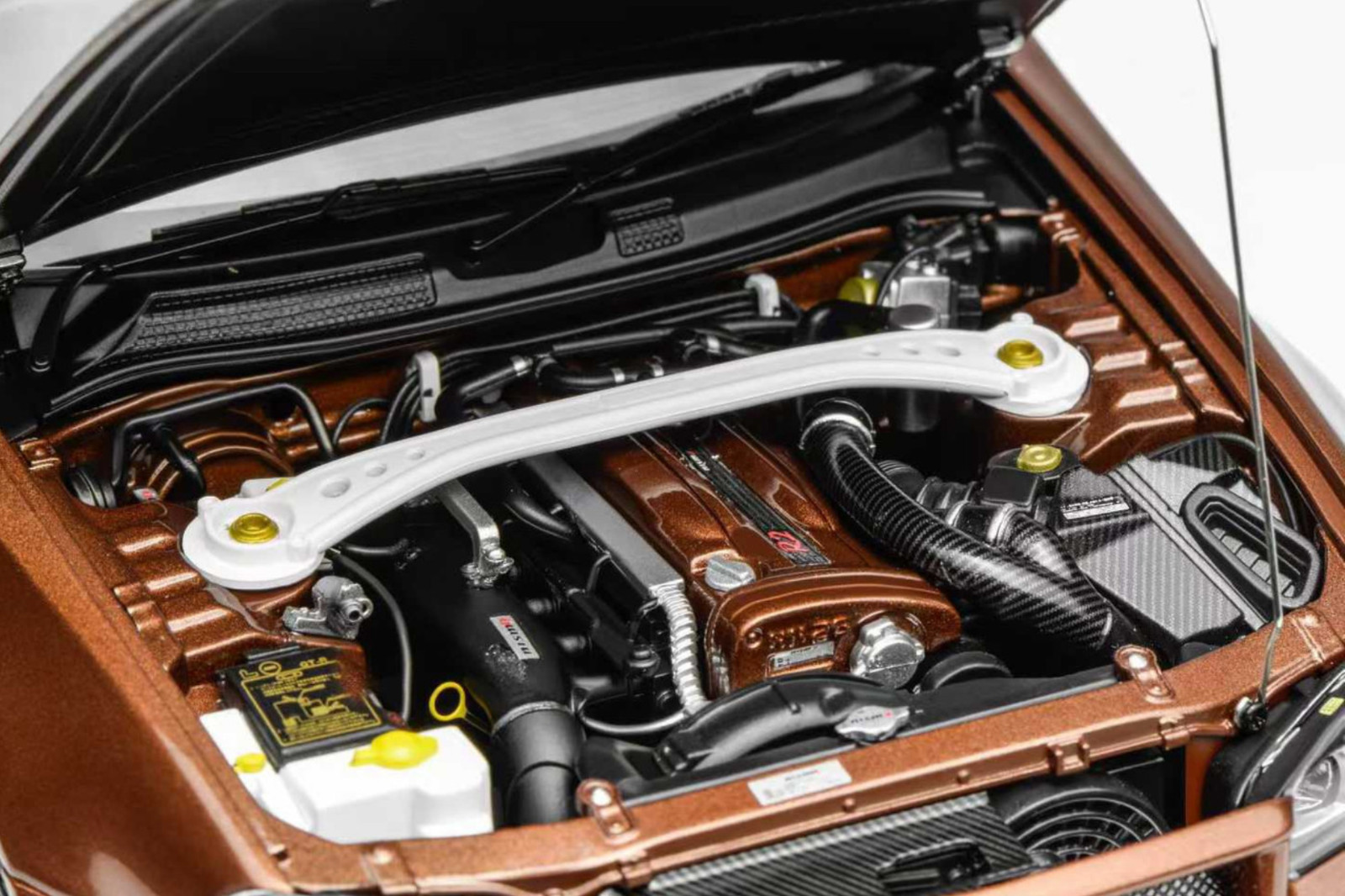 1/18 Motorhelix Nissan Skyline GT-R R34 in Metallic Bronze