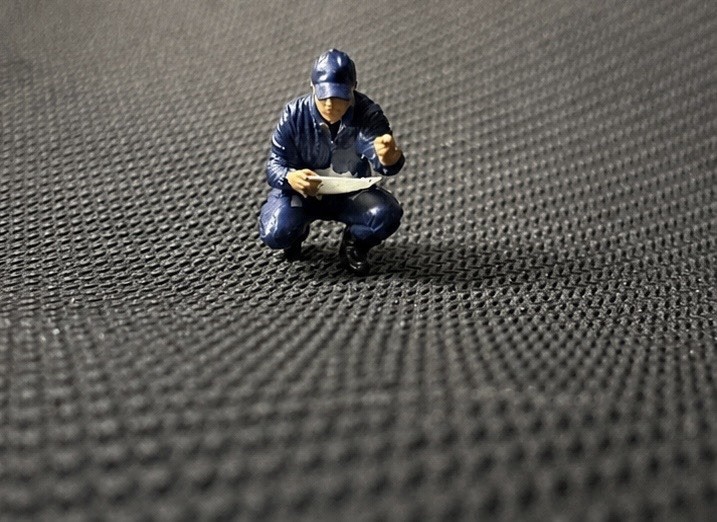 1:64 – Mechanic / Farmer / Trucker Figure Squatting – Garage & Farm Diorama