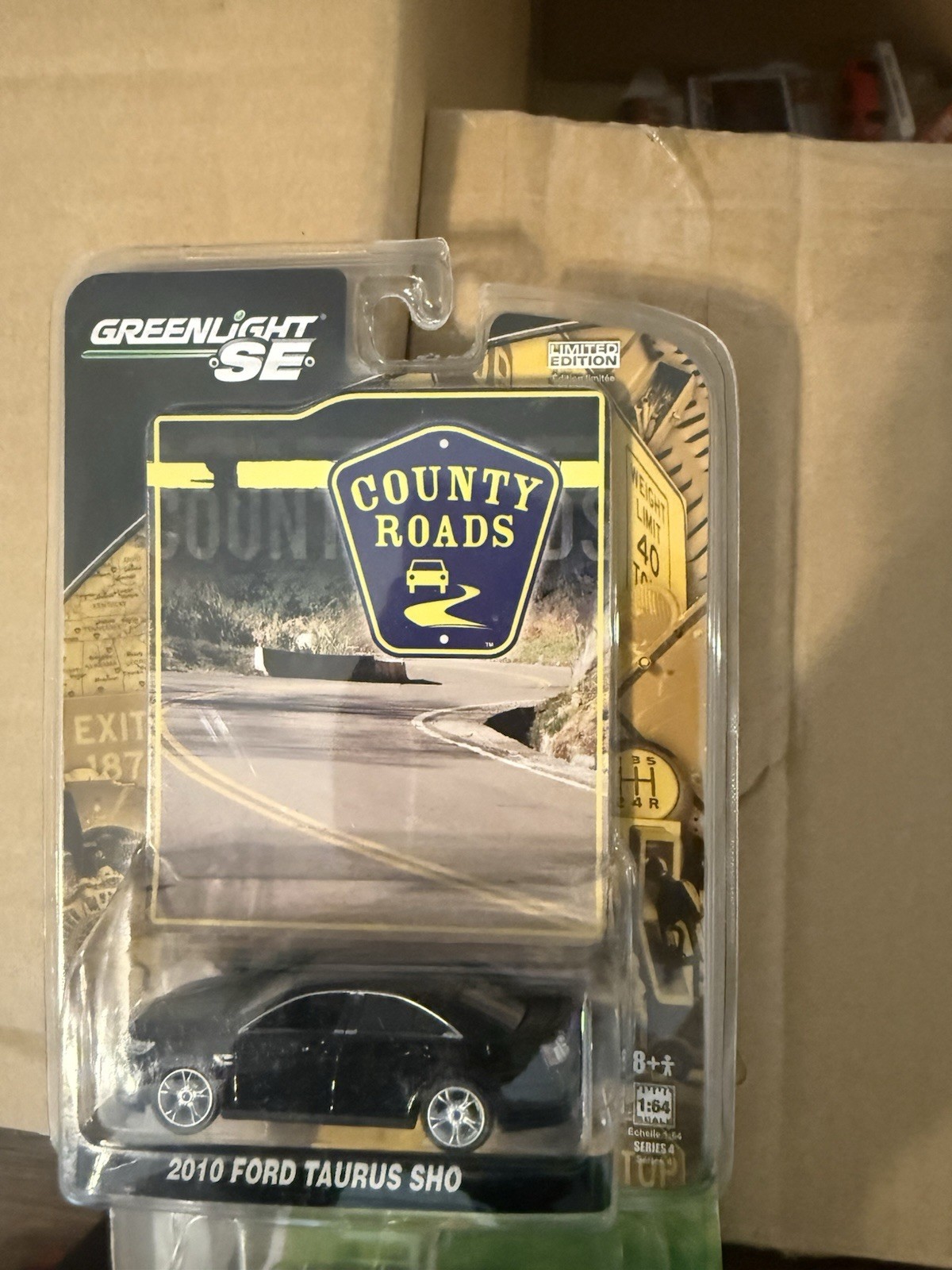 Greenlight 1/64 Ford Taurus 4 2 Blue 2 Black New