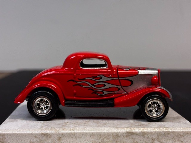 Johnny Lightning ’34 Ford Custom Coupe. 1:64 DIECAST. 2000. Red w/ Silver Flames