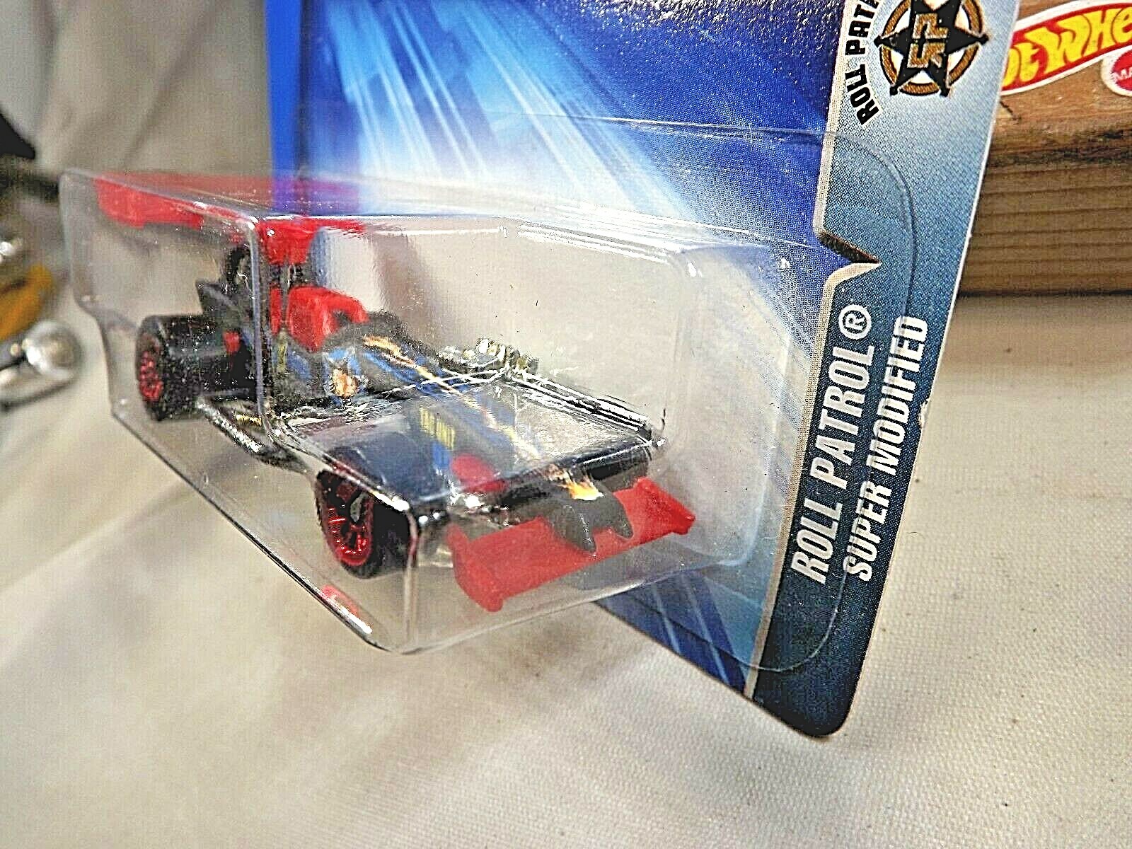 2004 Hot Wheels #189 Roll Patrol SUPER MODIFIED Black w/Red Lace Spoke Wheels