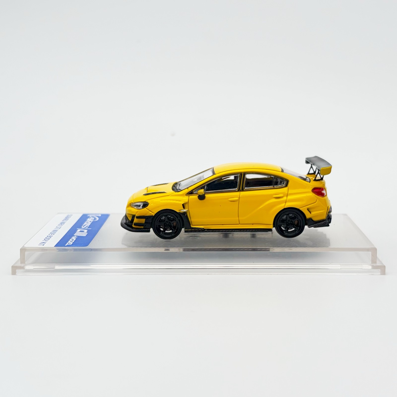 CM-Model 1:64 Subaru STi Varis Widebody 1.0 – Yellow CM64-STI-08