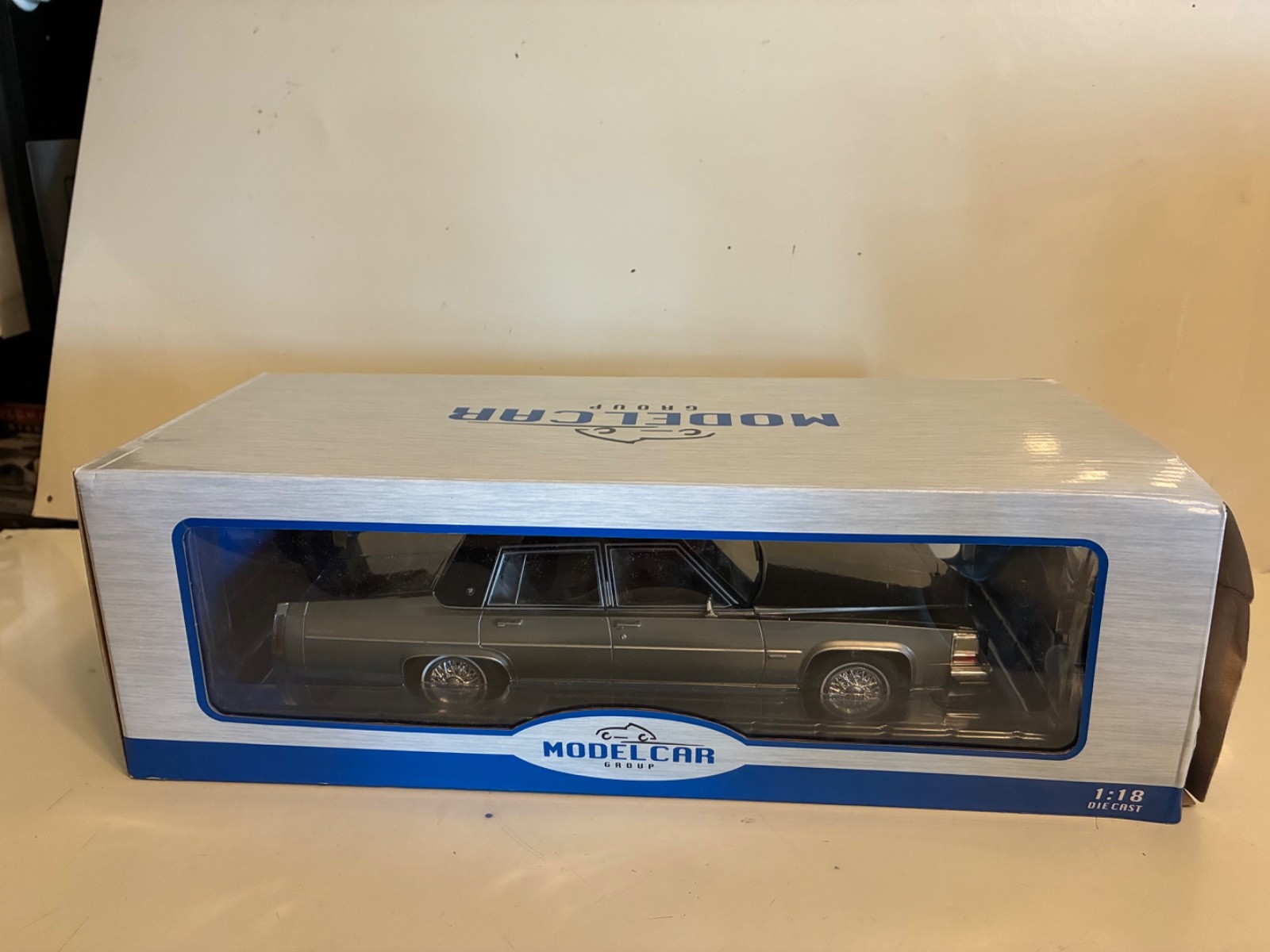 MCG 1982 Cadillac Fleetwood Brougham Grey Metallic 1:18 new in box box damaged