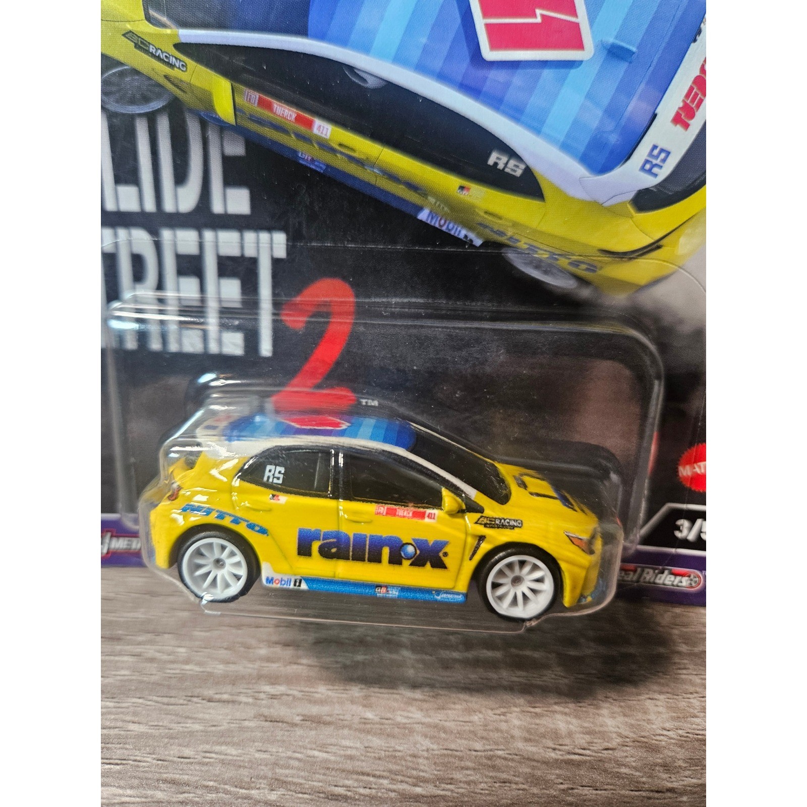 Hot Wheels Premium Slide Street 2 Toyota GR Corolla Yellow Rain-X 3/5 FPY86