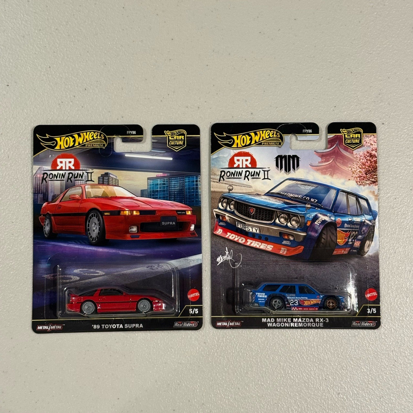 Hot Wheels Premium Ronin Run 2 Mad Mike Mazda RX-3 Wagon & 89 Toyota Supra Combo
