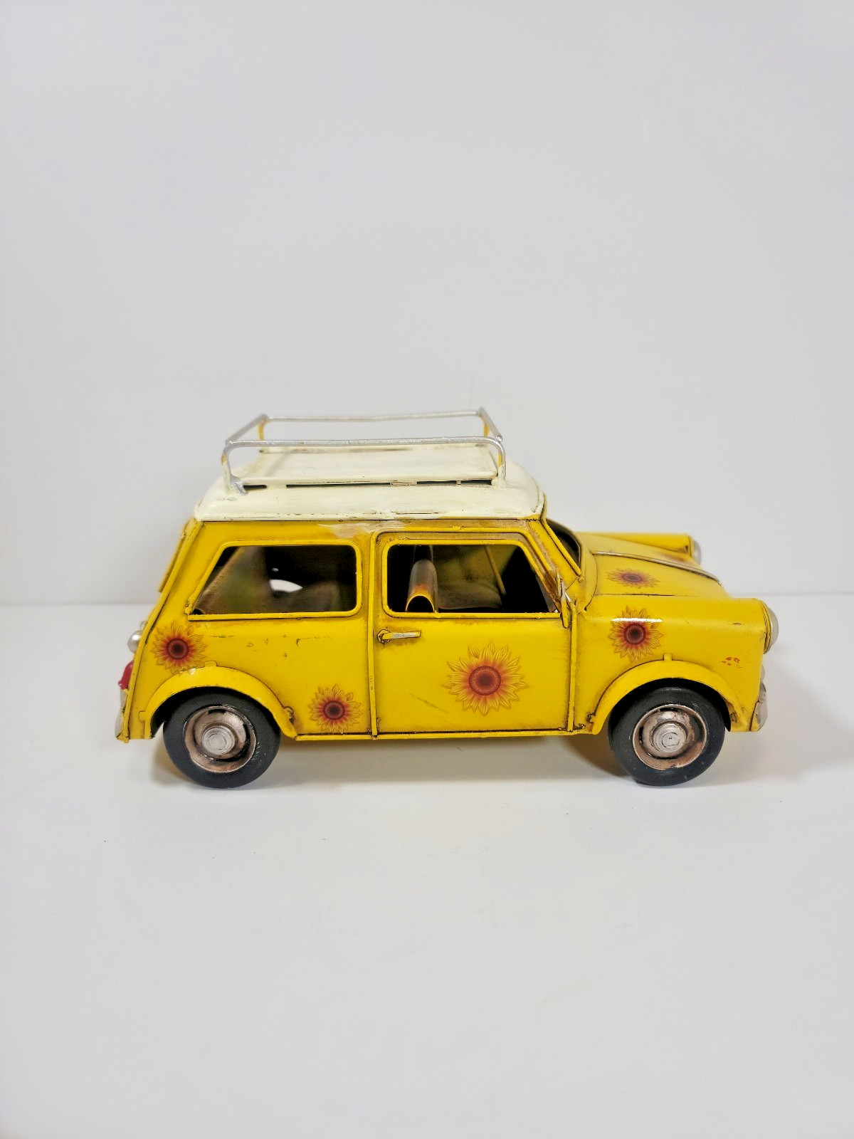 The Spring Shop Yellow Metal Mini Car with Sunflowers – Distressed Vintage Decor