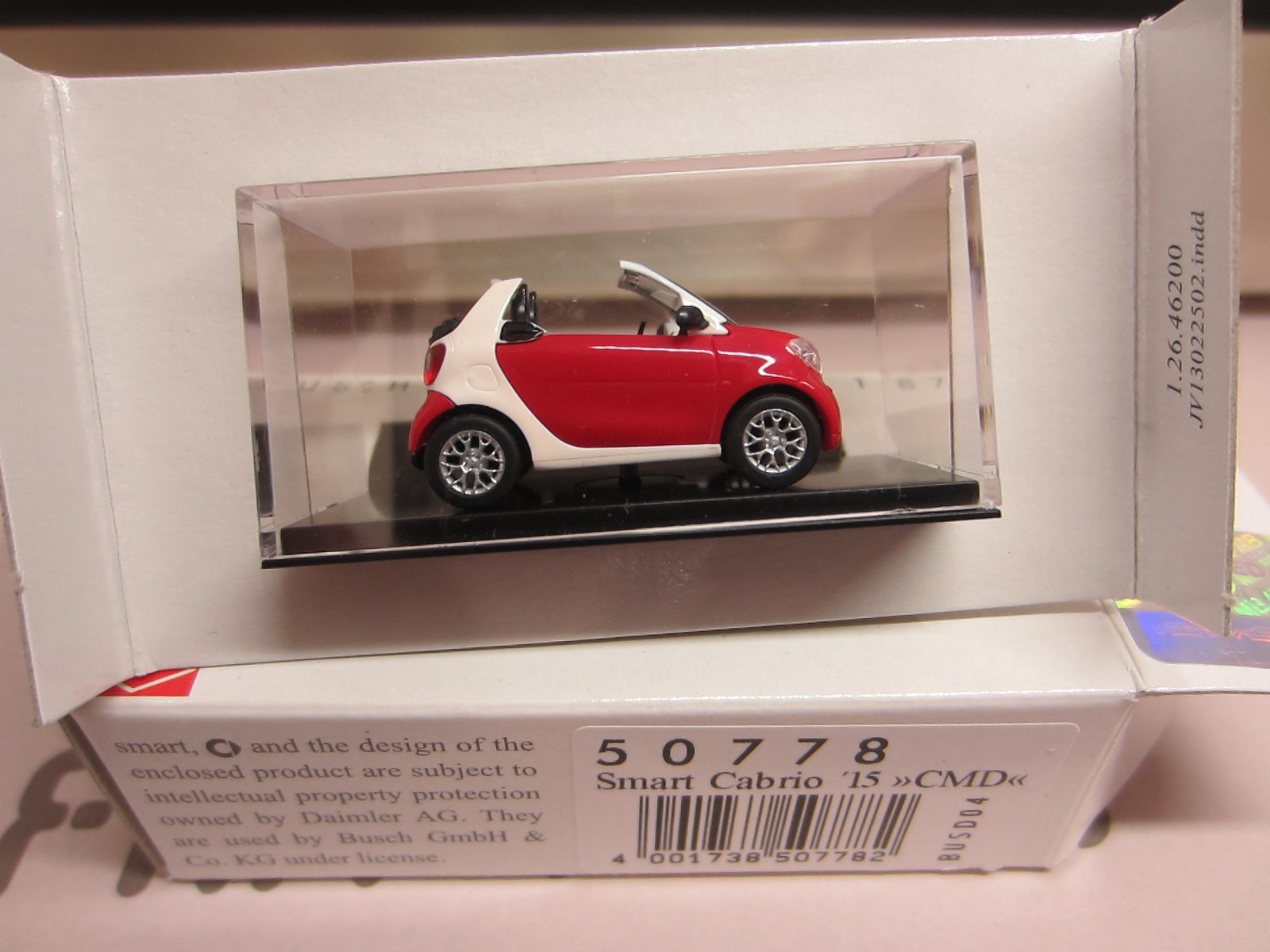 BUSCH 50778 SMART FORTWO CABRIO 2015 in RED – model is PLASTIC – HO / 1:87 scale